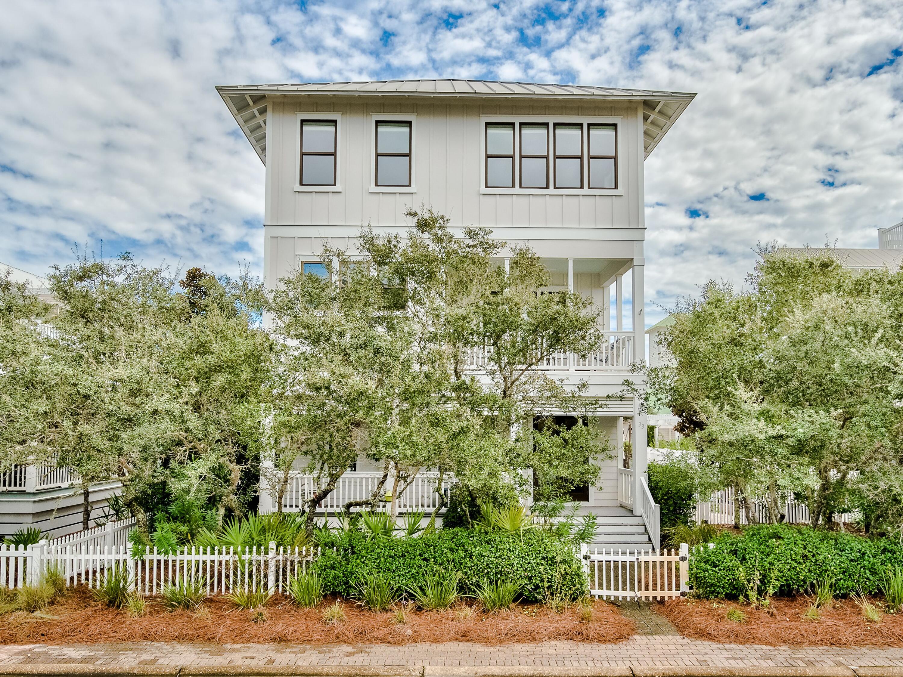 Enjoy a private heated pool and gulf views from this never-rented three-story home in the gated, gulf-front neighborhood of Old Florida Beach. Inside this four-bed, four-and-a-half-bath retreat is an incredibly spacious floor plan and an elevator that provides access to the second and third floors. The first floor of the home features a flex space that could be used as a sitting room, recreation room or bedroom, as well as a spacious laundry room and full bath conveniently situated near the pool. The second floor is designed for daily living with an open kitchen, dining and great room as well as a balcony perfect for enjoying the scenery with morning coffee. The third floor encompasses an owner's suite, sitting area with French doors, additional bedroom.