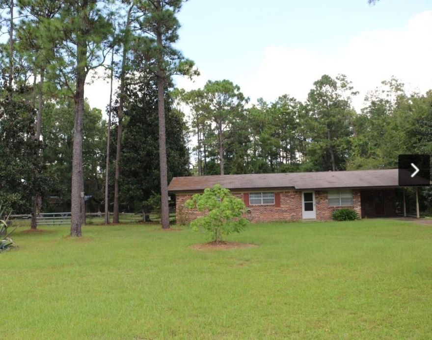 Great home in the City Limits of Freeport with 1.95 acres (4 total lots. This 3 bedroom and 2 bathroom brick home has many updates to include granite coutner tops in the kitchen, tiles flooring and large family room with fireplace. This property fronts on Jones Drive and backs up to Sparkleberry Lane, both paved and county maintained streets. The back yard is fenced and has a large workshop, shed and gazebo. The place has lots of potential and possibilities. Not many homes with acreage left in the area. Total of 4 lots and home sits on just one city lot. Potential for 3 additional units.