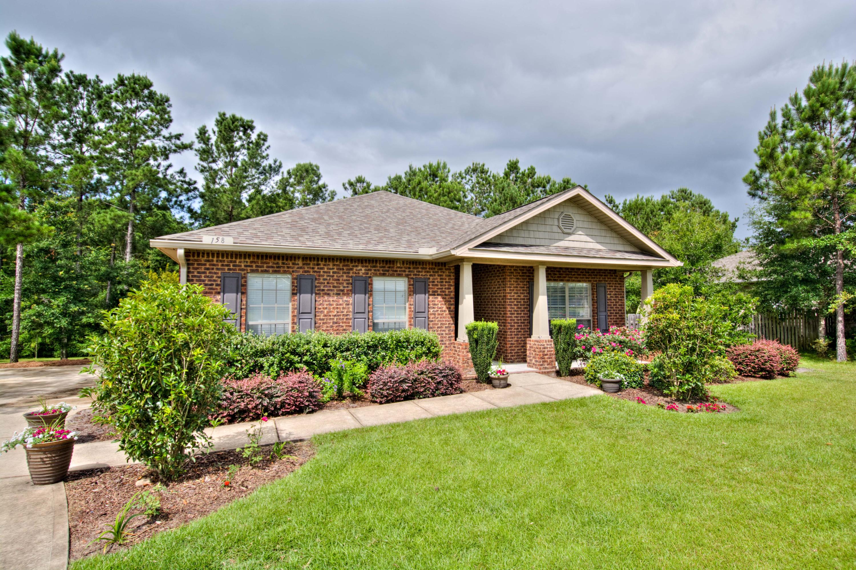 Oversized Private Preserve Homesite, One Story, 4 Bed, 2 Full Bath Home, Two Car Side Entry Garage w/extended driveway. Hammock Bay is a premier 3000 Acre Master Planned Bay Front Residential Community located along Highway 20, just 15 minutes north of sugary white sand beaches of the Florida Panhandle and Scenic Highway 30A.