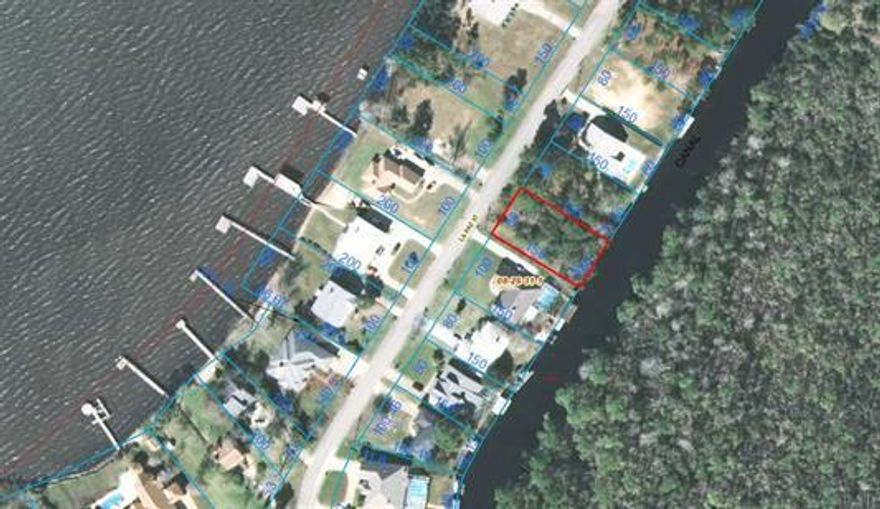 Enjoy stunning views of Perdido Bay along with the privacy of Bayou Marcus behind you. This quiet, friendly and well kept neighborhood is tucked away for you to enjoy the serenity of the water around you. Do not delay, come build your dream house on this fantastic piece of property today.