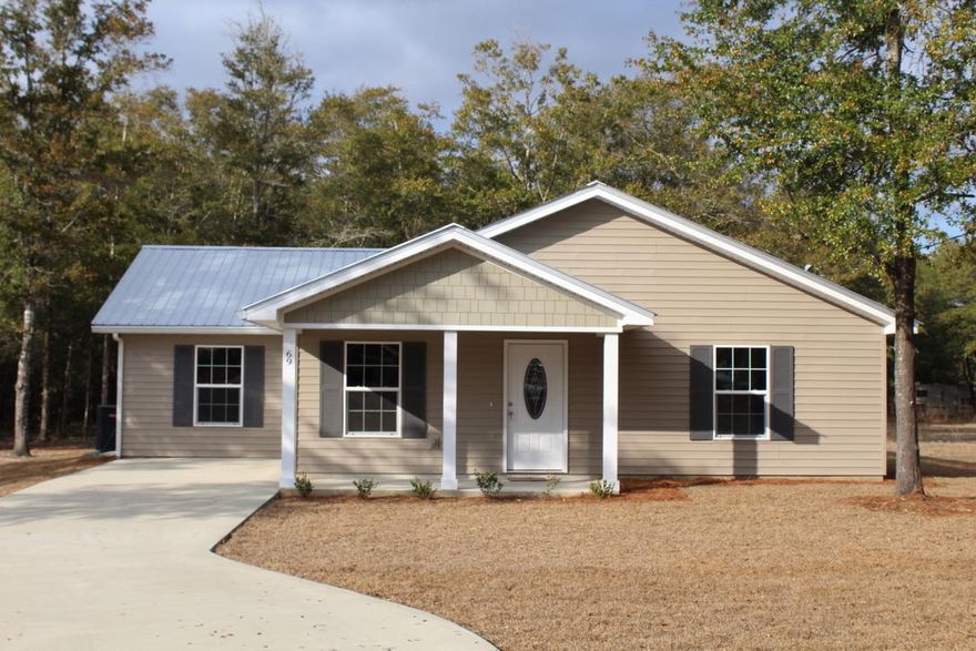 Seller says bring me an offer!!! Minutes to schools, shopping and historic downtown Defuniak Springs. You will love the open kitchen, dining floor plan. Lots of space and plenty of light. Stainless steel appliances including stove, refrigerator, dishwasher & built in microwave. Master bedroom includes walk in closet & a second wall accessory closet. Laminate wood floors throughout. Large lot with wooded back yard. You will love the space! Metal roof. Low maintenance Easy to show.