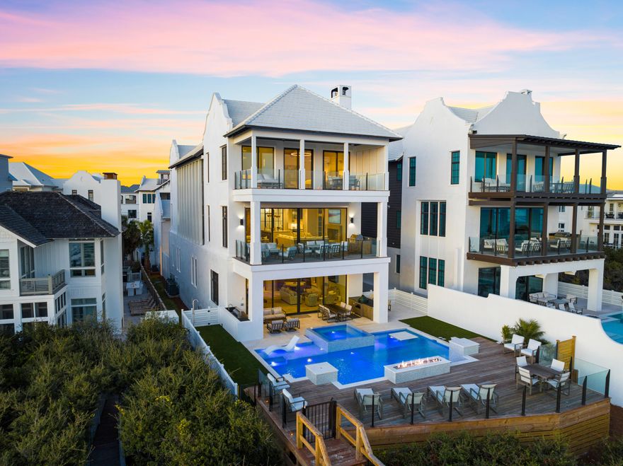 The pinnacle of Gulf front residential living primely located in Seagrove Beach along scenic County Highway 30A, this pristine new construction yields exceptional resort style amenities, unimpeded gulf views as well as striking architectural elements and commercial quality construction beautifully designed by Archiscapes & Cronk Duch. 3504 E Co Highway 30A is highlighted by 9 full bedroom suites, over 8,200 sqft of heated and cooled living space as well as an expansive open floor plan spanning three levels of vertical height. Masterful building materials juxtaposed endless hues of the emerald green waters of the Gulf of Mexico perfectly characterize this sprawling beach retreat with concrete block and poured concrete construction as well as exceptional features including one of the largest residential gulf front pools ever built in Northwest Florida. This legacy retreat embodies its naturalistic surroundings and is curated to host multigenerational gatherings while yielding ample privacy & seclusion. The private parking court offers ample parking & garage storage with easy turn around capability and optimal access to 30A. The masterful elevation spans three vertical stories with residential elevator accessibility to three floors for optimal comfort as well as a separate carriage house that hosts a full bedroom suite, laundry area, kitchen and living room. The first level of this home was positioned at a high elevation over 30' above sea level to take full advantage of the expansive views over the dunescape and offers a beautiful entry courtyard providing a sophisticated sense of arrival with french limestone floors throughout and a large first floor living area finished with custom bar and direct access to the resort style pool. There are multiple bedroom suites on the first level each offering as well as direct access to the rear pool deck highlighted by an outdoor kitchen, raised spa, saltwater pool, ample sized sun deck & wide open south and west elevations to enjoy endless sunsets.

The second level is the epicenter of the home. The chef's kitchen is thoughtfully designed with custom appliances and wood cabinets anchored by a massive center island and finely appointed finishes including a hand built vent hood from Thierry Francois along with his signature french oak flooring (which can also be found throughout the home). Meile appliances are standard throughout the kitchen including a gas range, paneled refrigeration, built-in coffee maker and multiple dishwashers. The open living room off the kitchen yields unparalleled views over the gulf and the rear resort style pool with access to expansive south facing porches and 10' glass sliding doors facing the Gulf of Mexico. The living room features beautiful ceiling details, masonry gas fireplace, ample seating, and an adjacent dining area with suspended glas wine storage and access to the fully stocked scullery.

The third floor is the primary suite level featuring an expansive primary bedroom along the southern elevation of the home with an ensuite spa-like bathrooms and substantial western views ideal for sunset elevations. The primary suite has exclusive access to the expansive south facing covered porch. The ensuite off the primary bedroom yields a beautiful marble mosaic tile with soaking tub and shower encased in suspended glass and overlooking floor to ceiling glass windows focused on pristine gulf views. The overall design and function of this home is unparalleled on 30A and offers direct beach access from a private beach walkover. Sanctuary at Seagrove is centrally located on 30A within excellent proximity to Seaside, Watersound and the coveted east end.

Please reach out to us today for the cost-to-own and rental projection figures for the property.