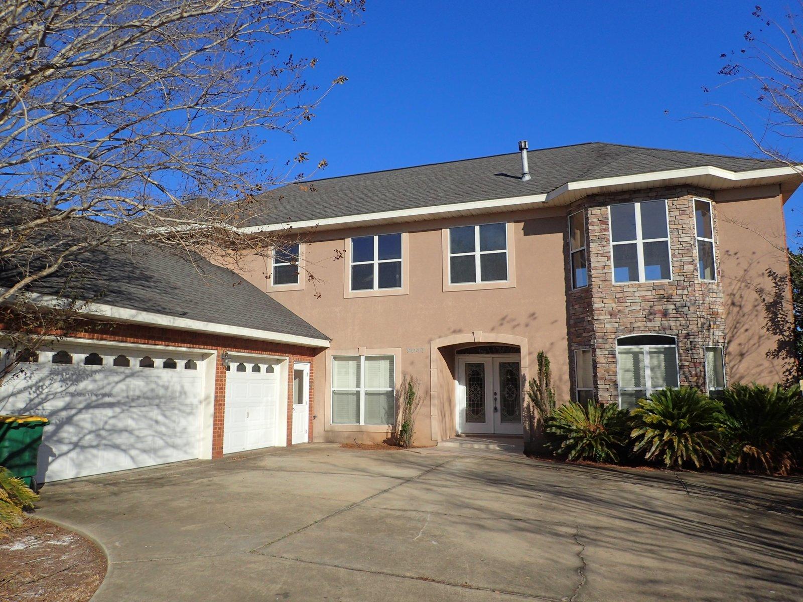 This stunning REO property is located the popular gated community of Heritage Park and is literally mins from Navarre Beach! Built in 2006, this 2 story home has privacy fenced back yard, side entry 3 car garage and a large balcony just off the upstairs master bedroom. Home has 4 bedrooms and 3 and 1/2 baths. A 1/2 bath is conveniently located just off the patio for outdoor use. Downstairs you will find all tile, fresh paint, a guest bedroom and full bath. Upstairs, 2 additional bedrooms and bath and a master bedroom to die for. Oversized with lots of windows and hardwood floors, this master will certainly be the envy of most. Master bath suite has large marble shower, garden tub and fireplace. A definite must see to appreciate. Call today!