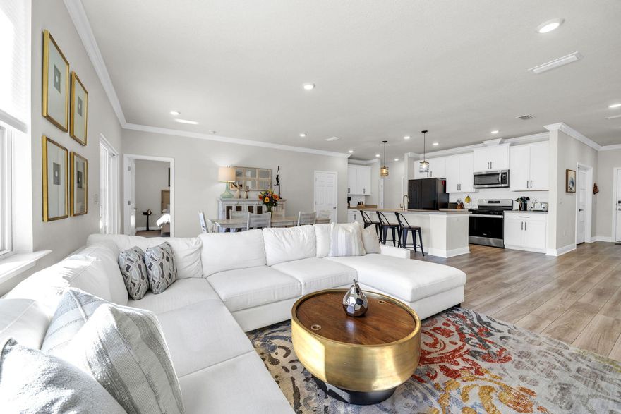 Nestled on a quiet cul-de-sac in the Parkview neighborhood within the highly sought-after Hammock Bay community. The home is a Ariana B Floorplan with a Truss porch featuring three bedrooms and two baths, along with two additional flex rooms that allow you to customize the space to fit your needs. One flex room can easily be converted into a fourth bedroom, while the other is ideal for a home office, playroom, gym, or second living area.The location is especially appealing for families. The home is close to the sports complex, school, and general store, making it easy for kids to bike to practice, school activities, or meet up with friends, all while enjoying the safety and privacy of a cul-de-sac setting. One of the standout features is the ease of getting in and out of the community. You have direct access to Highway 83 without having to drive through the neighborhood, making daily commutes and beach trips quick and convenient. From here, you're also ideally located for easy access to the beaches along 30A, as well as Miramar Beach and Destin.

The open layout is complemented by white cabinets, misty gray quartz countertops, EVP flooring in the main living areas, crown molding, and an upgraded appliance package. The owner's suite features a tiled shower, adding a polished and functional touch. The oversized backyard is a standout, offering plenty of room for a pool or outdoor kitchen, making it perfect for entertaining, pets, or simply enjoying extra outdoor space. The garage has an EV charger for electric cars.

As a resident of Hammock Bay, you'll enjoy resort-style amenities including multiple community pools, a large clubhouse, a state-of-the-art fitness center, tennis and pickleball courts, basketball courts, walking and biking trails, frisbee golf, and a general store. The community also offers access to a professional park with local businesses, Props Brewery, food trucks, and regular events on the lawn featuring a jumbotron, creating a true sense of community and connection.

Parkview combines a neighborhood feel with one of the most amenity-rich lifestyles in the area. This home is a great fit for anyone looking for flexible living spaces, room to grow, and exceptional convenience.

Buyer to verify all dimensions.