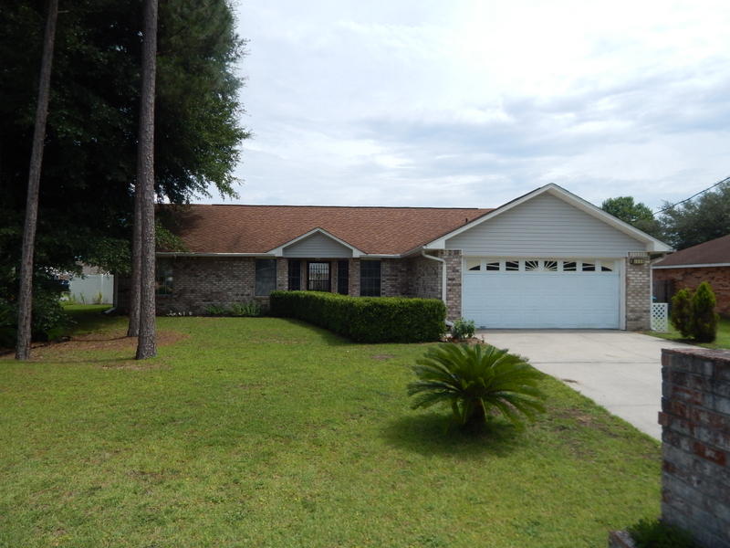 Check this out! 4 Bedrooms, enclosed in-ground swimming pool and a corner lot. This 4 bedroom is set up in a split bedroom floor plan with vaulted ceilings, plant shelves and French doors. The guest bathroom has a bright skylight and services 3 of the bedrooms. The master bedroom is spacious and has a very elegant master bathroom. The master bath has nicely designed tiled floors and a custom tiled shower with glass doors and built-ins. There is a soaking tub, water closet, a walk-in closet and double vanities. The ceilings throughout are knock down texture, the utility room has it's own wash tub and this highly efficient home is serviced by a nearly new heating and cooling system. There are French doors from the great room into the fully finished tiled Florida room.