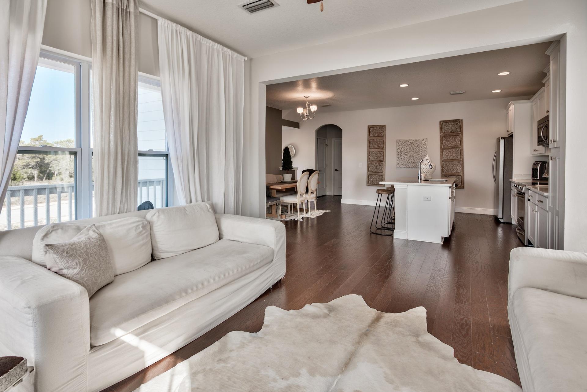 Phenomenal 4-bedroom, 3-bath home with Gulf views in Inlet Heights with beautiful finishes throughout. This home has a fantastic location close to the Gulf of Mexico and Inlet beach access - great for a full time residence, second home or vacation rental. The popular 30Avenue is nearby with many dining, entertainment and shopping options as well as prestigious communities like Rosemary & Alys Beach. Great curb appeal with the paver stone driveway and welcoming brick archway. Home features a 1-car garage and beautiful hardwood flooring throughout the home. The kitchen is breathtaking with beautiful Quartz countertops, stainless steel appliances and contemporary shaker cabinets. The kitchen is open to the dining & living area making this home great for entertaining.