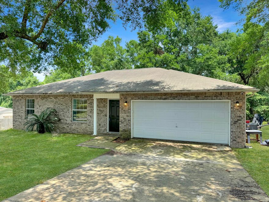 This charming 3-bedroom, 2-bathroom home is the perfect blend of comfort and style. From the moment you step inside, you'll be greeted by the warmth of lvp flooring that flows seamlessly throughout the entire house, ensuring a modern look with easy maintenance--no carpet anywhere! The heart of this home is its beautifully updated kitchen. Featuring sleek countertops, contemporary cabinetry, and stainless steel appliances, this kitchen is designed to inspire your inner chef. The open-concept layout allows for effortless entertaining, with the kitchen overlooking the living area! HVAC was replaced in the last year. Don't miss the opportunity to make this house your home!