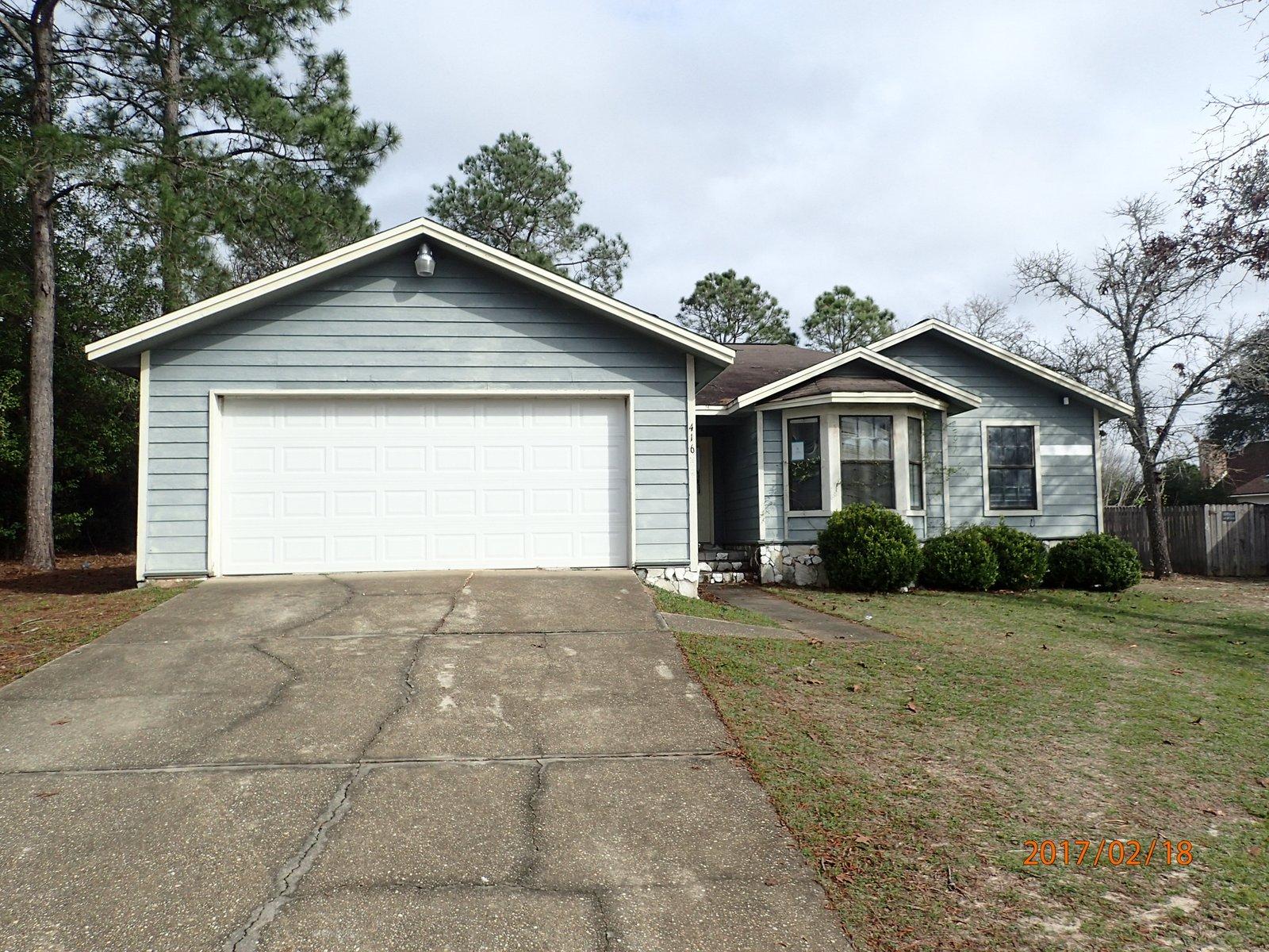 This REO property is located in the heart of south Crestview and is convenient to shopping, interstate, and Duke Field. Home is just over 1400 sf and has 2 car garage, privacy fenced back yard, and wood lap siding. Inside you will find a large open living area that opens to the kitchen/dining area. Master bedroom is large for this square footage and has his and her walk in closets. Mostly tile floors throughout, this property does need some work and therefore will only qualify for conventional or 203k financing. Call today to view the potential!