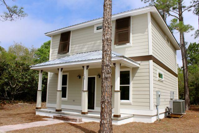 CONSTRUCTION COMPLETED AND ON THE SOUTH SIDE OF 30-A FOR THIS GREAT PRICE! New home built by Burt Cosson. This lovely cottage includes many details for an amazing price point. Some of those features include: stainless under mount kitchen sink, granite counter tops, GE stainless appliances, transom windows throughout, upstairs and downstairs porches, tile downstairs, ceiling fans included in all bedrooms and living room, hardi-board, impact windows, and laundry room. This cottage has Cambria (Quartz) bathroom countertops and Piedrafina (Marble) shower/bath walls. This will be a fabulous buy for someone looking for that brand new beach cottage, short distance to the beach, and NO HOA fees.LED lighting and gas tankless water heater.Floors are beautiful and wainscoting downstairs. Call Today