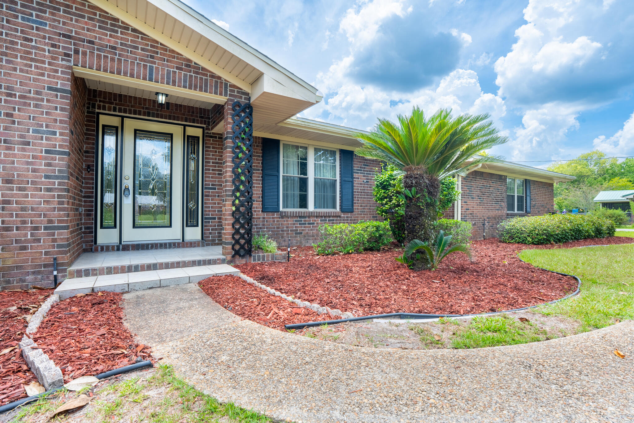 This Town & Country estate features a sprawling ranch home AND a detached 2BR/1BA apartment on nearly an acre lot! A vegetable garden & swimming pool would be the perfect addtion to this lushly landscaped property with mature trees, fruit trees & blooming perennials! If relaxation is in your future, enjoy a respite in the heated & cooled Florida room & then take a dip in the hot-tub! This homestead offers dedicated formal living & dining spaces as well as a comfortable, casual den area with unique fireplace & large eat-in kitchen. Laundy area & half-bath are conveniently located just off the kitchen! The spacious apartment is great for guests, mother-in-laws or extended family! Lawn care? No worries! All lawn equipment conveys with the property! Country life with city convenience!