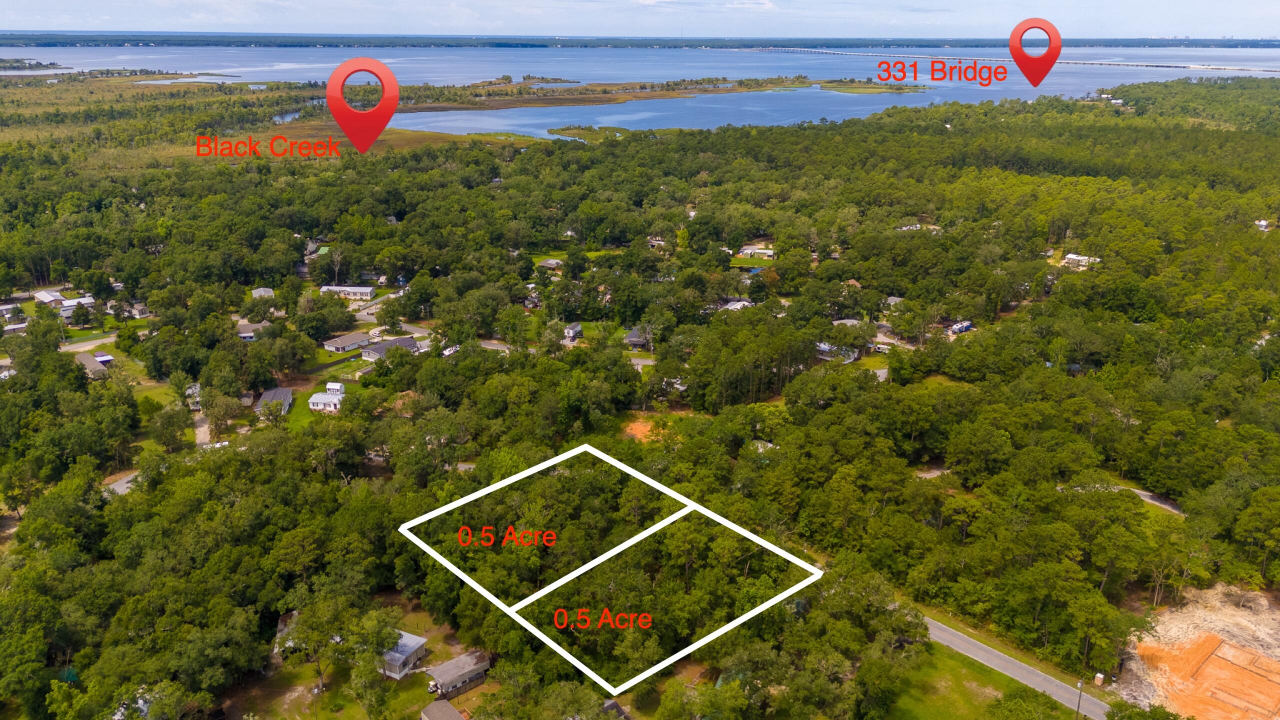 **Prime Lot Location at Black Creek! ** This beautiful, mulched, high-dry lot is in close proximity to Black Creek, which leads to the stunning Choctawhatchee Bay. You can enjoy sunrises and sunsets, fishing, boating, and camping to your heart's content! The property is located approximately 1.5 miles from the popular Black Creek Lodge and RV campground, a beloved destination for years. Black Creek Lodge features a large boat ramp that locals can use for a nominal fee. If you're searching for a comfortable and relaxing spot to establish your dream home or a fantastic retreat, this is it! The property has minimal restrictions, no HOA, is zoned as Rural Residential, and is located in Flood Zone X. This lot truly checks all the boxes! Conveniently, it's just 20 minutes from the world-famous sandy white beaches of Florida's Emerald Gulf Coast. You'll also find plenty of natural beauty, with numerous state parks, springs, and rivers nearby.
The property requires a septic tank, but public water is available (tap fee paid by the seller). The sellers understand that a grant has been issued to bring sewer services to this area in the future, but it's advisable to check with the City of Freeport for confirmation on timelines.
Buyers should perform due diligence regarding building codes and zoning regulations with the appropriate local authorities to ensure the property can be used as intended. While the information in this listing is deemed accurate, it is not guaranteed.
Lot 10 is also available creating over an acre of land. Seize this rare opportunity today!