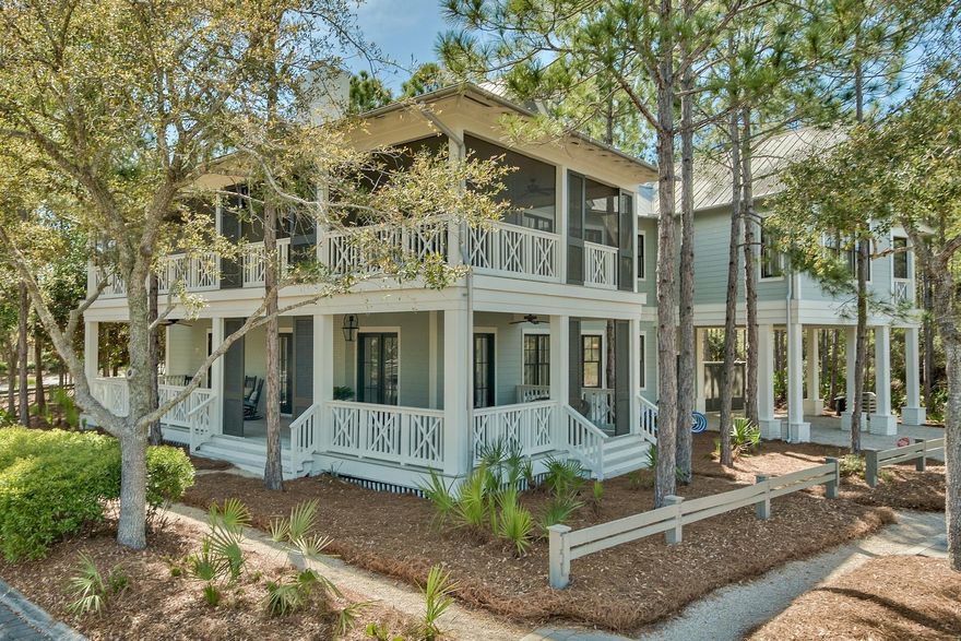 Nestled in Watercolor's Camp District. Steps away from Camp Watercolor. Wonderful corner lot overlooking Mere Ridge and small lake, this home features quality construction and upgrades, vaulted ceilings in main living area. Open living area with access to screened wraparound porch.