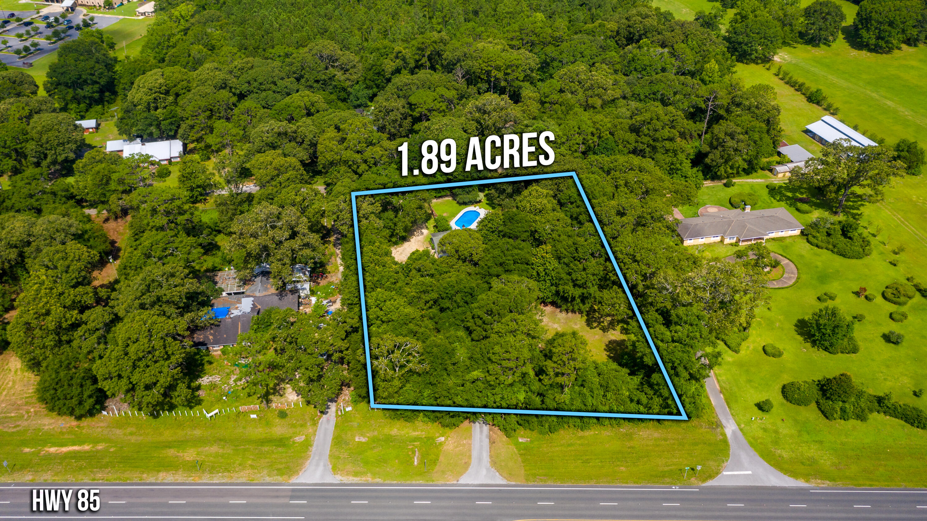 Fantastic COMMERCIAL location just north of the Northcrest Plaza and Winn-Dixie Plaza on Hwy 85! The listing is for nearly 2 acres of land with a high traffic count daily along this very busy stretch of highway! The zoning is C-1 and the property usage presents endless possibilities!