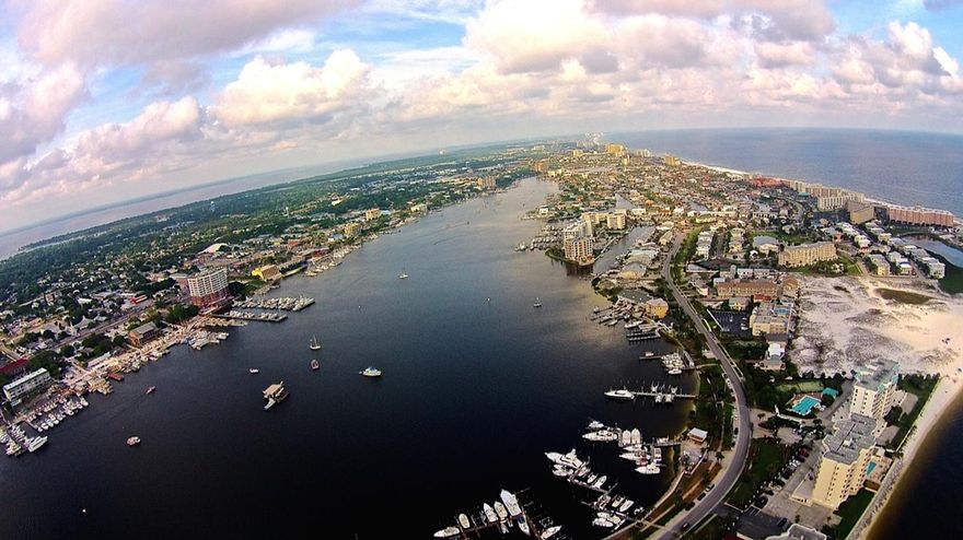 Must Sell - Price Reduced $30,000. A very special, one-of-a-kind opportunity to live on the beach in a residence that offers the space and privacy of a home on the water, with the convenience, security and maintenance free lifestyle of a luxury condo. This 3 bedroom, 3 bath condo boasts 2,365 square feet with features of tile flooring throughout, granite counter tops, a split bedroom floor plan, two separate entrances and balconies with water views from every room. Additional features include a wet bar with ice maker, large open kitchen with plenty of cabinet space & treyed ceiling, a spacious living room, laundry room and extra storage. East Pass Towers II has only 6 private garages and this unit comes complete with one of them along with an added storage space.