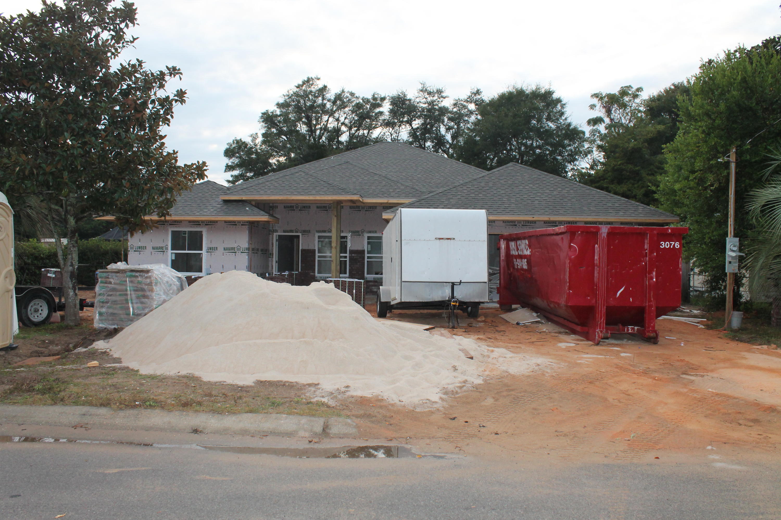 Picture is of a similar home. Awesome floor plan by multiple award winning builder, and past Parade of Homes multiple award winner! This is also a Golf cart friendly area, and minutes to downtown Fort Walton Beach (beaches, dining, schools, shopping, etc.) This 4/2 custom brick home has super curb appeal. There will be 10 Ft. Ceilings w/ impressive crown molding, hand scrapped hardwood flooring, and 5 1/4'' baseboard throughout the main living areas. As you enter the home through the covered front porch, the formal dining room is on your right. As you continue down the hallway, you will then enter the chef's delight kitchen which will boast custom maple cabinetry, granite countertops, 2 large pantry's, and stainless appliances (including an oversized commercial grade frig./freezer). At the left of the home's entrance is bedroom one, continuing down the hallway is the guest bath, then bedroom two. The oversized greatroom is in the rear of the home and opens to a covered porch, which is perfect for entertaining. The master suite is oversized, has 2 large walk - in closets, a linen closet, a walk - in shower with a custom glass shower door, a whirlpool garden tub, and a double vanity. The laundry room is at the rear of the kitchen, and has a door which opens to the garage. The yard will be beautifully landscaped and comes complete w/ a well, sprinkler system and timer. Home has a Taexx ''in the wall'' pest control system that is accessed from the exterior of the home for the owner's convenience. The yard will be beautifully landscaped and comes complete w/ a well, sprinkler system, and timer.