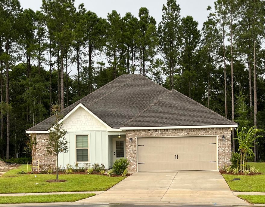 The BROOKDALE III G in Moonswept at Hammock Bay community offers a 3 bedroom, 2 full bathroom, open design.  Upgrades added (list attached).  Features:  double vanity and walk-in closet in the master suite, covered patio, recessed lighting, undermount sinks, framed mirrors, smoke/carbon monoxide detectors, landscaping package, architectural 30-year shingles, flood lights, and more!Energy Efficient Features: water heater, kitchen appliance package, vinyl low E windows, and more!