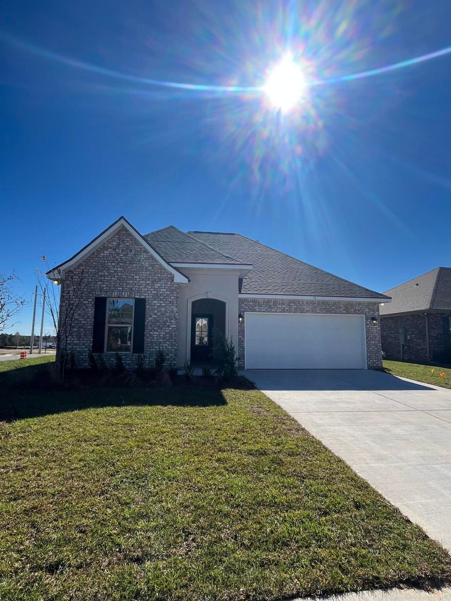The TRILLIUM IV A in The Bluffs at Lafayette community offers a 3 bedroom, 2 full bathroom open and split design. Upgrades added (list attached).Special Features: double vanity, garden tub, separate shower, and walk-in closet in master bath, kitchen island, walk-in pantry, boot bench in mudroom, covered porches, crown molding, ceiling fans in living and master, smoke and carbon monoxide detectors, landscaping, architectural 30-year shingles, flood lights, and more!Energy Efficient Features: tankless gas water heater, kitchen appliance package with gas range, vinyl low E windows, and more! Energy Star Partner.