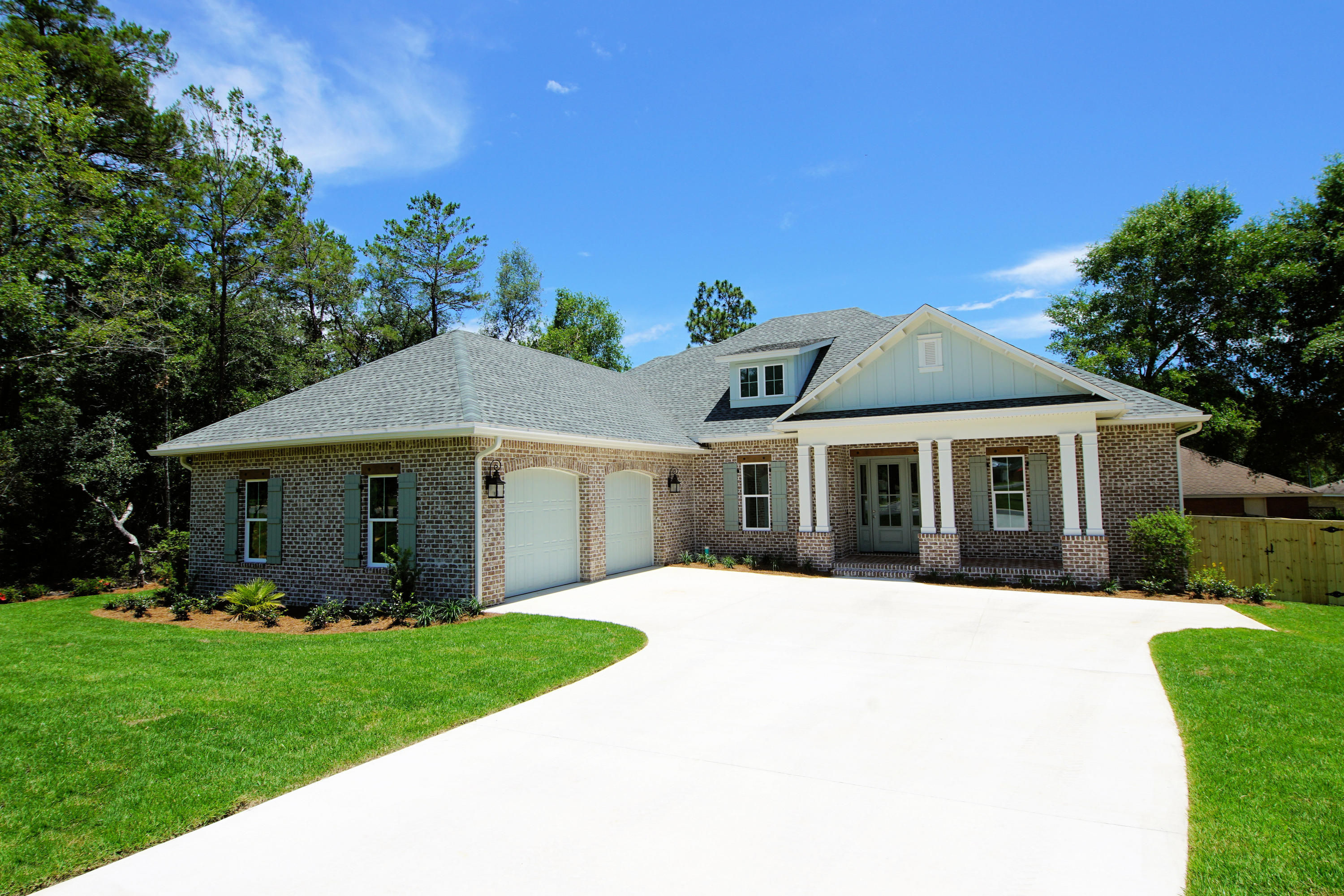 Beautiful, one story home in the highly desirable Deer Moss Creek, Niceville's newest subdivision! This gorgeous home features 4 bedrooms and 3 baths and will have a mix of LVP flooring, tile and carpet. Quality construction includes impact resistant windows, insulated doors, brick and Hardie Board siding and more. Deer Moss Creek is a mixed-use community including single family, multi-family, commercial, a village town center and light industrial. Phase 1 in DMC, Hartfield, features 98 single-family lots ranging from .11-.38 acres. A paved trail system is planned to run along the path of the creek. The center of Phase 1 boasts a park and gazebo as well. Plenty of lovely trees, sidewalks and future plans include a community pool, community center, more parks, a bike path and more