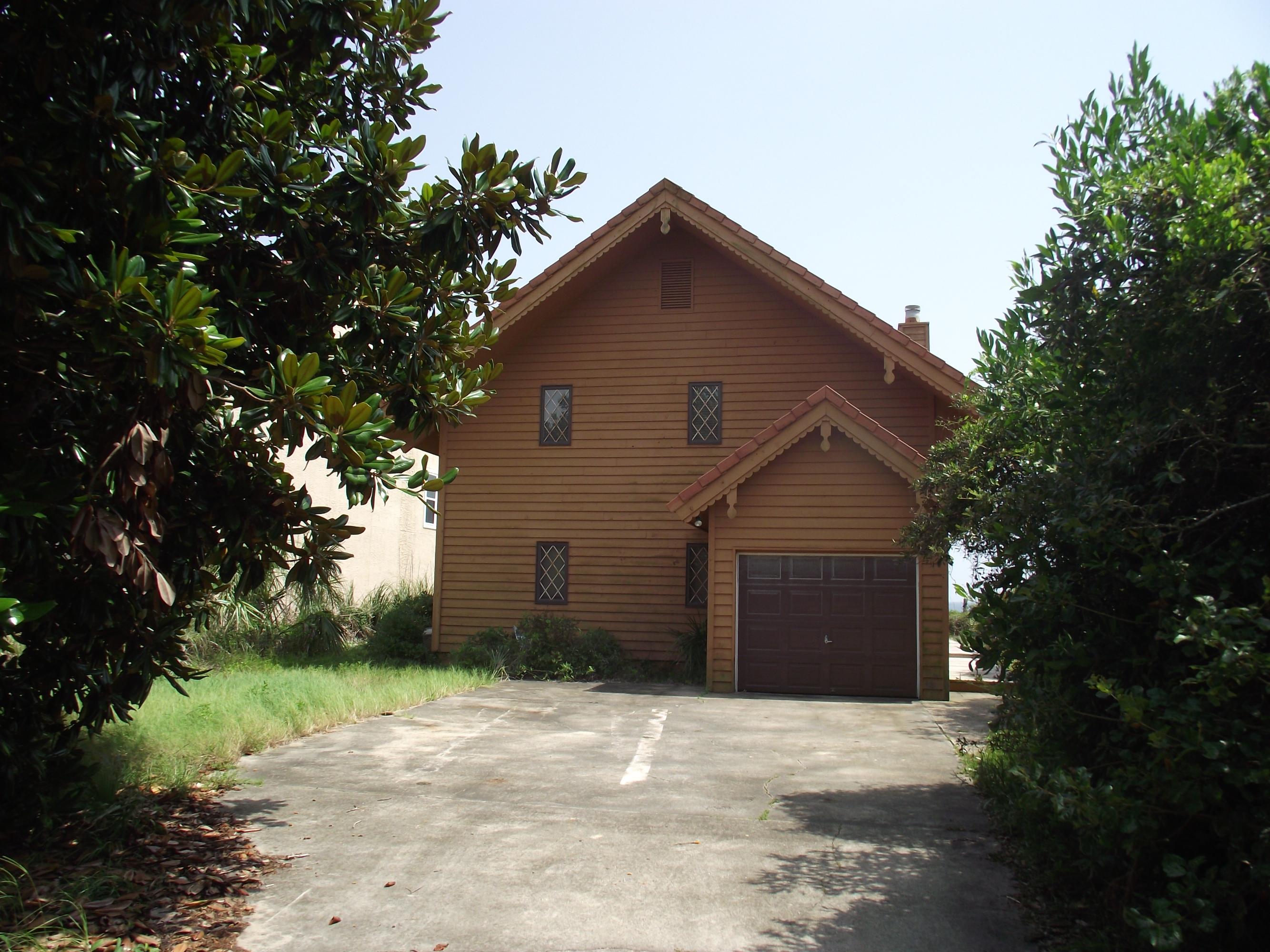 TWO STORY HOME ON A LARGE GULF FRONT PARCEL 59' X 377' X 59' X 374'+-. PROPERTY IS LOCATED ON A HIGH BLUFF WITH PLENTY OF SPACE TO BUILD A GUEST HOME AND PUT IN A POOL. THE COUNTY HAS CONFIRMED THE SUBJECT PROPERTY IS ZONED NEIGHBORHOOD INFILL, YOU CAN DEVELOP THE PROPERTY ( MULTIPLE UNITS ) OR REMODEL & UPDATE THE EXISTING HOME. FEATURING 4 BEDROOMS, 3 1/2 BATHS, THIS CHARMING TUDOR STYLE HOME HAS PLENTY OF ROOM FOR YOUR FAMILY AND VISITING FRIENDS & RELATIVES. THE 1ST FLOOR WINDOWS ALONG THE BACK FACING THE BEACH WERE RECENTLY REPLACED, AS WELL AS THE SIDING ON THE SAME SIDE WITH HARDI BOARD. GREAT LOCATION, BETWEEN ROSEMARY BEACH & WATERSOUND & CONVENIENT TO FINE & CASUAL DINING, UNIQUE BOUTIQUE SHOPPING, & GREAT GOLF COURSES. GREAT POTENTIAL! CALL TODAY FOR A SHOWING!