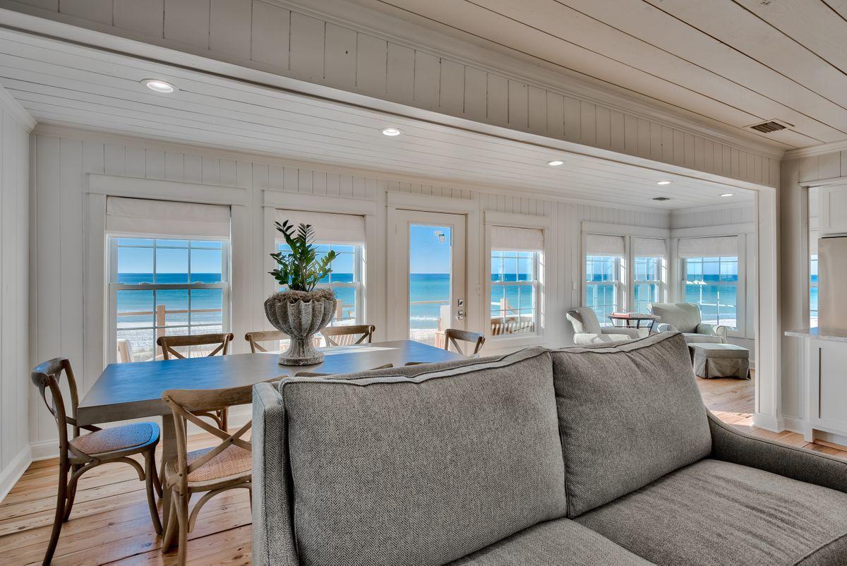 Fully Renovated Gulf-Front Cottage! This inviting Inlet Beach home has been completely remodeled and is being sold fully furnished. The home is open, bright, and offers several windows with stunning views. Elegant finishes include hardwood floors, shiplap walls, beautiful tile showers, and a sophisticated kitchen with granite countertops and high-end stainless steel appliances. Wake up to water views from the master bedroom, and enjoy sunrises and sunsets from an outdoor patio that overlooks the gulf. Located right on the water, this is a perfect opportunity for a primary or secondary home buyer looking for easy beach access for swimming, fishing, and all other aquatic activities.