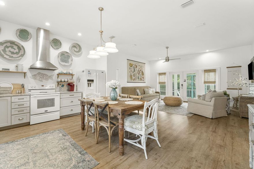 PRICE REDUCTION! FURNISHED! Welcome to this gorgeous custom-built home on a double lot in Laguna Beach. Don't miss this exceptional home with luxury appointed features and 10-foot ceilings throughout. The open floorplan seamlessly blends style and functionality perfect for relaxing and entertaining. Home was built to be a primary residence, and it shows. Impact windows, galvalume roof, concrete siding, spacious detached 2 car garage with golf cart. Fenced in yard. Screened in front porch spans the entire length of the home. Gourmet kitchen has everything you need, including specially designed glass door cabinet accents. Two fabulous bedrooms that easily accommodate king sized furniture with ensuite spa like bathrooms with custom tile work. Handcrafted built in twin bunk beds. Plenty of room for outdoor living. With the addition of sewer coming to Laguna Beach a future pool would be a nice addition. 

Short walk or golf cart ride to Laguna Beach, Carousel vintage grocery store and Thomas donuts, 30Avenue 5.7 miles, airport 20 min, Rosemary 6 miles.

**see list for minimal exclusions** 
