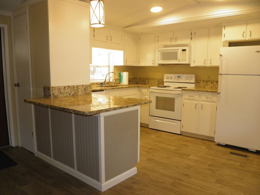SINGLE FAMILY HOME! Final cleaning underway. Clean & Well maintained 2BR/2BA WITH additional cozy room for office/flex space  One bath en-suite. Recently renovated home on it's own private lot/private driveway.  Partially fenced. Washer/Dryer included with Rent. Tenant responsible for all utilities. .  Renovated kitchen with granite counters, kitchen Island & newer appliances.   Newer metal Roof, covered brick patio,newer paint, newer wood look Vinyl flooring. Tiled, walk in shower in one bath.  HVAC 2018.  2 vehicle private parking.No smoking, No vaping, No animals. No more than 2 room mates at the published price.Viewing by appointment only - no sign on property.  Final rent and security deposit, subject to review of the application Owner is a licensed real estate agent.