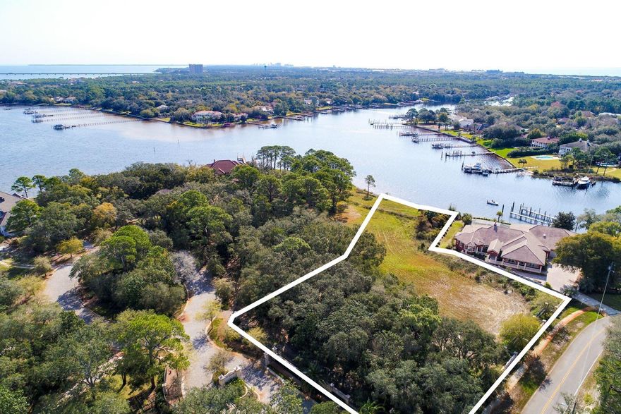 The Estates at Indian Pointe gated community has been professionally designed for luxury, waterfront lifestyles that blend dazzling, unobstructed water views with abundant boating and water recreation. With 120 feet of private waterfront, deep water access and 1.5 acres for your dream retreat, this is the largest property in the Estates at Indian Pointe on Choctawhatchee Bay. More than 125 water surface square miles run some 27 miles long and up to six miles wide, affording boat enthusiasts opportunities for fishing, cruising, water skiing, kite boarding, parasailing and access to the Gulf of Mexico through East Pass or Santa Rosa Sound. Salt and freshwater fish reside here, and keep the binoculars handy for bald eagles, herons, jumping dolphin and wildlife indigenous