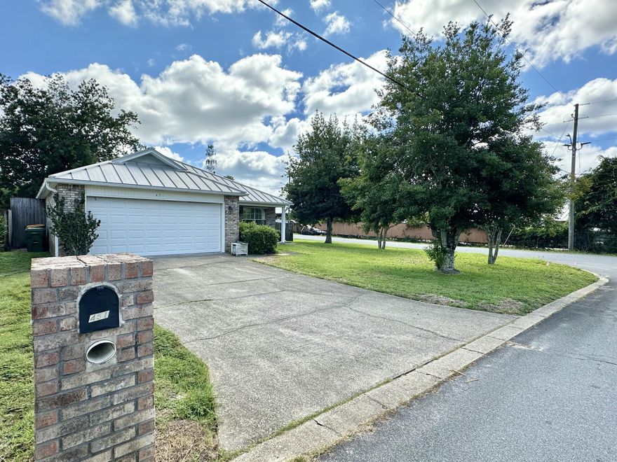 $5,000 Buyer Credit! Welcome to the cozy subdivision of Rush Park, tucked off Hwy 98 and conveniently located to Hurlburt Field, and Eglin AFB! Enjoy easy access to the area's shopping, dining, beautiful beaches and boat ramps. This charming brick 3-bedroom, 2-bath home sits on a corner lot with a spacious, privacy-fenced backyard, RV/Boat Pad--an ideal place to call home. Step inside to a large, open living area with tile floors and a gas fireplace that creates an inviting atmosphere. The kitchen offers plenty of storage and a separate breakfast nook that opens to the Florida room. Outside, a workshop provides space for yard tools or creative projects. The primary suite easily accommodates a king-sized bed, while two additional bedrooms down the hall share a nice guest bathroom. Call now! Don't miss your chance to make this one yours. Schedule a private tour today!