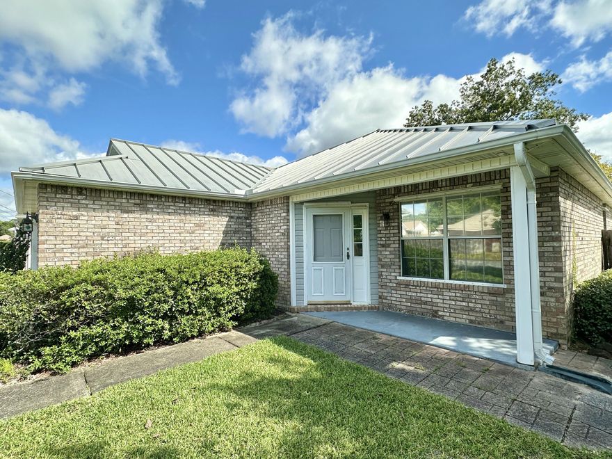 Welcome to the cozy subdivision of Rush Park, tucked off Hwy 98 and conveniently located to shopping, dining, Hurlburt Field, and Eglin AFB! Enjoy easy access to the area's beautiful beaches and boat ramps. This charming brick 3-bedroom, 2-bath home sits on a corner lot with a spacious, privacy-fenced backyard--an ideal place to call home. Step inside to a large, open living area with tile floors and a gas fireplace that creates an inviting atmosphere. The kitchen offers plenty of storage and a separate breakfast nook that opens to the Florida room. Outside, a workshop provides space for yard tools or creative projects. The primary suite easily accommodates a king-sized bed, while two additional bedrooms down the hall share a nice guest bathroom. Homes in this location don't come up often. Don't miss your chance to make this one yours. Schedule a private tour today!