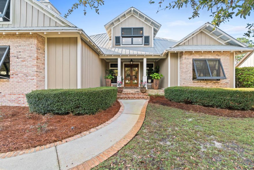 Currently Under Contract With Contingency!!! We extend a gracious welcome to this unparalleled home, crafted in 2005 by a visionary artisan for her private residence. Situated within Botany Bayou, this splendid home showcases exceptional refinement in all aspects of its design and construction.A grand entrance is embraced by the expansive covered front porch, adorned with a hanging gas lantern and flanked by bespoke double front doors, extending a warm invitation to family, friends, and esteemed guests.