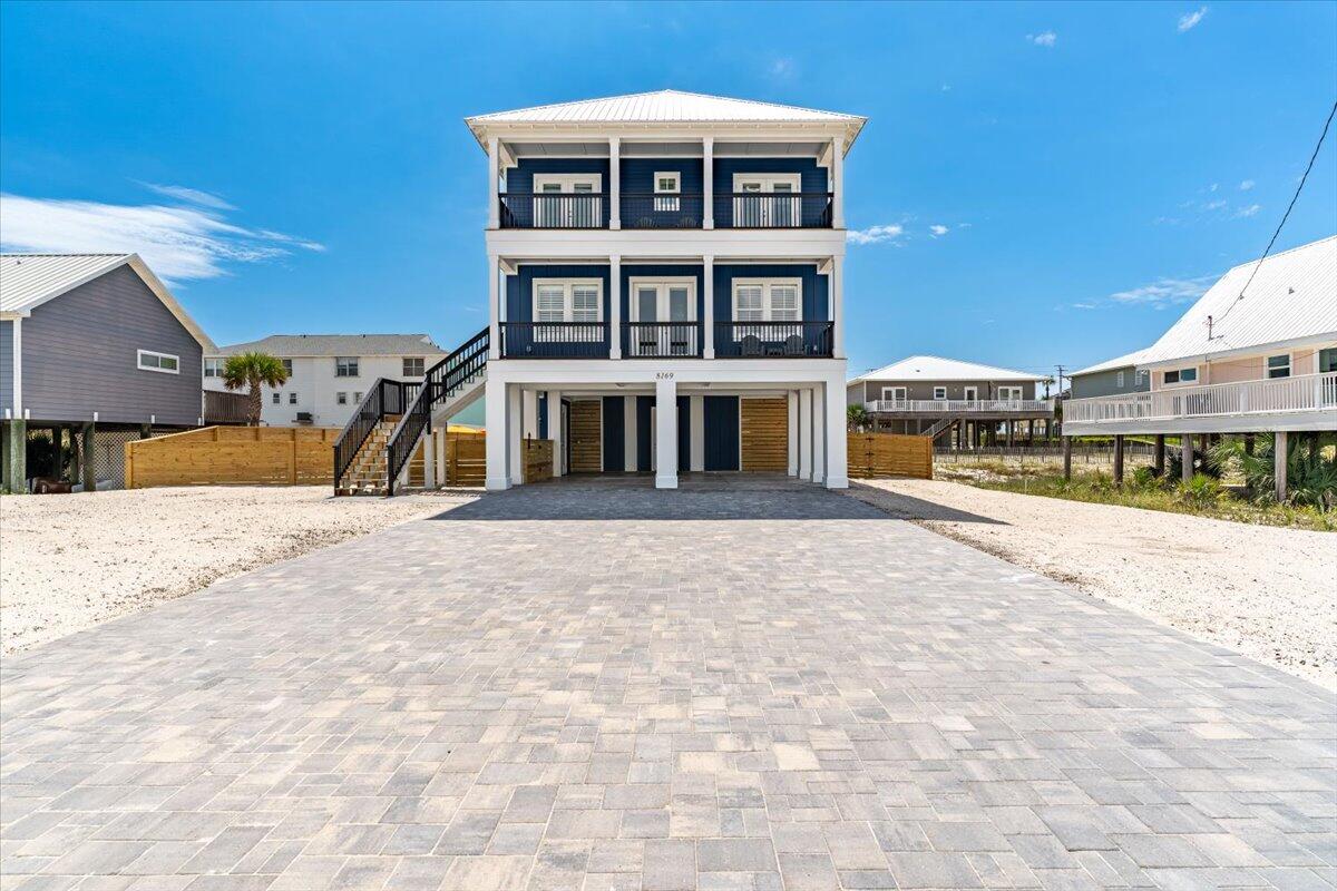 Great Investment opportunity, six month Rental Projections 200K. Minutes to the beach & Intercoastal. Welcome to 8169 White Sands Blvd, located on Navarre Beach Island, 6BR, 6.5 Baths. Fully equipped kitchen complete with high end appliances, elevator servicing all levels of home. Fully furnished home ready to rent day one. Plantation shutters throughout & decks on both front & back with views of canal & beach. Fully fenced yard with private pool & hot tub.