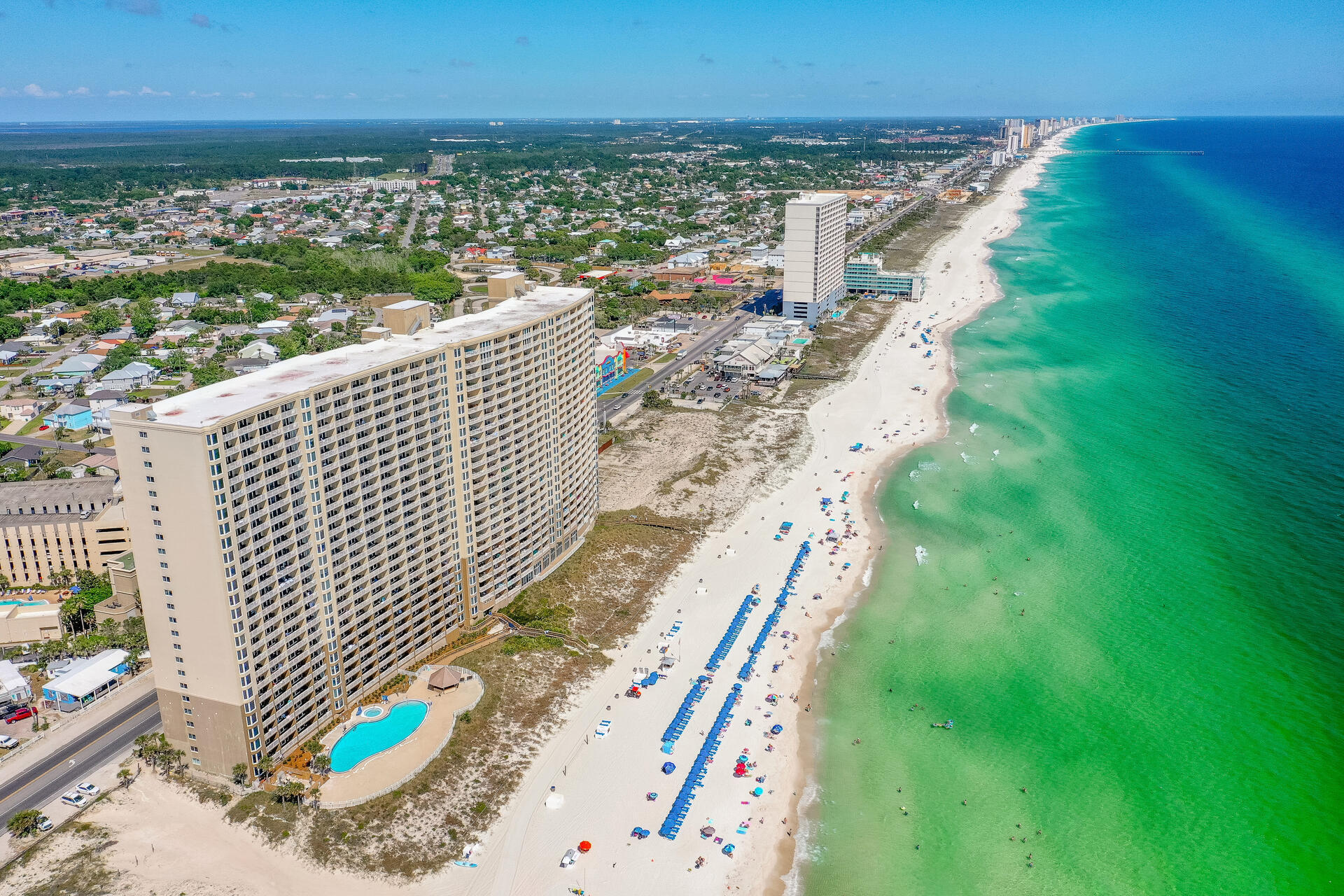 SHORT TERM INCOME MACHINE! This unit makes $52-62K annually! Available to show 9/3 between 10-4 and 9/5-9/7. Beautiful, furnished 2 bedroom and 2 bathroom condo in Emerald Beach Resort with 1299 square feet! Best priced condo in the Resort!! The Emerald Beach Resort has many amenities to include two large pools, a Gulf front Tiki bar, Sky Bar, fitness center, gift shop, onsite Starbucks, and covered parking! Emerald Beach Resort is a full-service resort and close to the beaches, restaurants, and shopping at Pier Park. This unit features new luxury vinyl plank flooring, updated lighting, and a large balcony overlooking the Gulf!