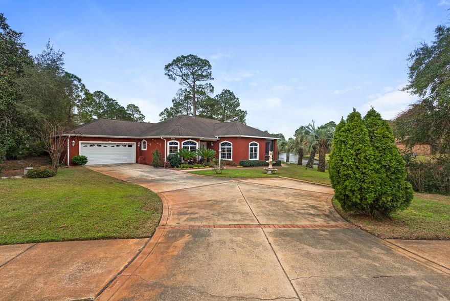 Set within the desired Bluewater Bay community and with lovely views over the lake, this move-in ready home offers a life of leisure. The brick split bedroom floorplan is spacious with three bedrooms and two bathrooms, plus multiple living spaces.
The master bedroom enjoys views over the lake, plus dual closets and an ensuite with a garden tub, walk-in shower and dual vanities.
There is a large family room with a gas fireplace, plus an office, a formal dining room and a breakfast nook. The kitchen is a great size and is well-equipped with a suite of quality appliances, plenty of storage and counter space.Outside, an open patio is a great place to relax and there is also a screened-in porch with views over the lake,with a flat-screen TV and room for a Jacuzzi. Beautiful crown molding, coffered ceilings and recessed lighting features throughout, creating a modern and elegant space. Extra features abound and include a whole home audio system, an oversized attached garage, roof hurricane straps and extra insulation.

This gorgeous home is set within the Bluewater Bay community with access to amenities such as golf, tennis, swimming pools and a marina.

The Eglin Air Force Base and quality schools are also close-by, while it's just 10-minutes to beautiful Destin beaches.