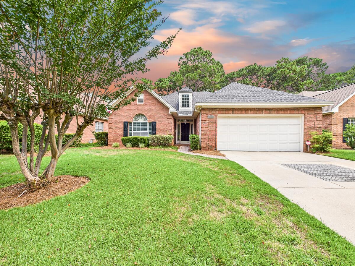 Check out the 3D Tour!! Welcome to 4455 Turnberry Place in Bluewater Bay! This beautifully maintained 3-bedroom, 2-bath home is tucked away on a quiet golf course lot in one of the area's most desirable communities. From the moment you walk in, you'll notice the soaring ceilings, refined crown molding, and abundant natural light that give the home a spacious, airy feel.The open-concept layout seamlessly connects the living room, dining area, and kitchen, perfect for everyday living and entertaining. The living room features custom built-ins, a cozy gas fireplace, and stunning views of the manicured backyard. Just off the living space, enjoy the year-round comfort of a heated and cooled Florida room leading to a paver patio, ideal for morning coffee or evening sunsets. The kitchen is both functional and stylish, with granite countertops, stainless steel appliances, and a gas range for the home chef. The spacious primary suite includes private patio access, a large walk-in closet, and a luxurious ensuite bath with a tiled garden tub, walk-in shower, granite double vanity, and vessel sinks. Recent updates include refinished wood flooring and fresh neutral paint (July 2025), a dimensional shingle roof (2017), and a new water heater (2018). HVAC is 2007. Ample storage is available throughout the home, including attic space above the garage. Bluewater Bay offers resort-style amenities just 10 minutes from Destin beaches, including golf, pickleball, three pools, walking trails, marina with restaurant, boat ramp, and RV/boat storage. Move-in ready and packed with charm, don't miss your chance to call this one home!