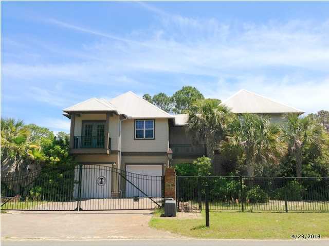 Stunning bayou front home in Harborview Estates, a five homesite community, each with a private gated entrance. Superb construction with great attention to every detail. Finely appointed with travertine floors, hardwood floors, granite counters, beautiful cabinetry, fireplace with built-in audio/video cabinet above, upgraded plumbing and lighting fixtures and much more. Luxurious master suite, master bath with travertine counters, jetted tub, separate tiled shower with rain shower head. Second level media/game room, full bath and a ''secret room'' perfect that's heated and cooled, perfect for seasonal storage. Your guest will enjoy the private, separate guest house with living area and kitchenette, second level bedroom and full bath, balcony. The courtyard pool will be a favorite