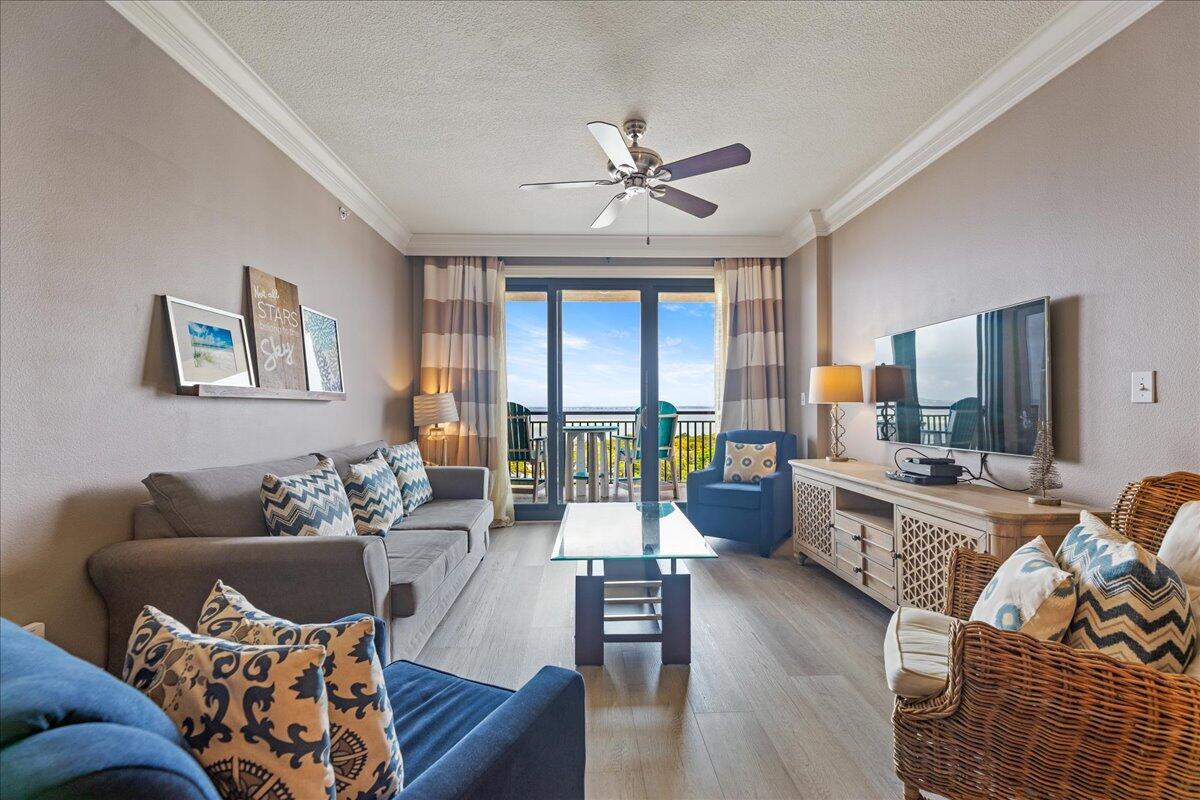 Discover the ultimate in coastal luxury in this impeccable 3-bedroom, 3-bathroom condo, positioned on the 5th floor to provide stunning views over the serene Crab Island. This elegant home offers a seamless blend of comfort and sophistication.As you enter, the spacious open-plan living area greets you with its chic decor and high-quality finishes. The living room, adorned with stylish seating and contemporary accents, leads to a broad balcony where stunning water views await. It's an ideal spot for enjoying your morning coffee or watching the sunset over the water.The gourmet kitchen is a chef's delight, featuring modern stainless steel appliances, ample cabinetry, and a tasteful backsplash. The breakfast bar, covered with a granite countertop, provides a casual dining space, making it perfect for entertaining guests.
Each bedroom is thoughtfully designed to ensure relaxation and privacy. The master suite is a true retreat, boasting direct access to the balcony, where views of the bustling harbor and tranquil waters create a picture-perfect backdrop. The attached master bathroom offers a spa-like experience with its large walk-in shower and refined fixtures.
Additional features include a laundry area, ample storage space, and exclusive access to the building's premium amenities such as a fitness center, swimming pool, and private parking.
Located conveniently close to gourmet restaurants, chic boutiques, and vibrant nightlife, this condo offers the perfect blend of tranquility and access to local attractions.
Whether you are seeking a vacation rental property or a vacation home, this condo combines luxury living with breathtaking views in one of the most sought-after locations.