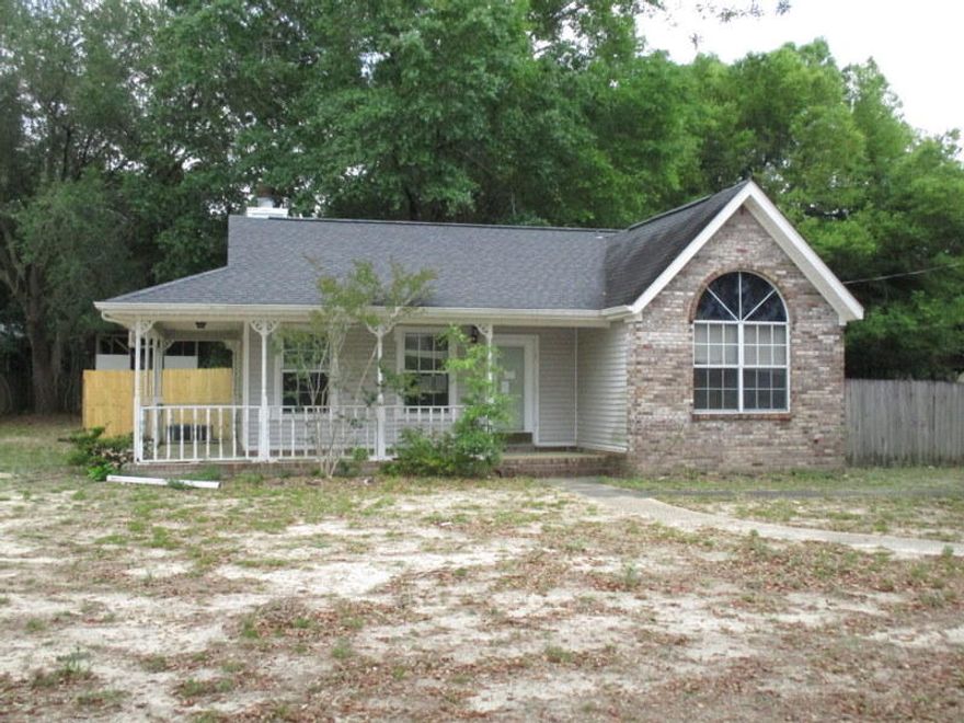 An REO property that is cute as a button and has tons of potential? This is it! Located in south Crestview off of John King Rd and is convenient to everything! Right at 1529sf this 3 bedroom 2 bath home has vaulted ceilings in living room with fireplace, galley style kitchen and large covered porch on the exterior. There is a detached 1 car garage as well as privacy fenced back yard. Home will not qualify for all financing so viewing the home is a must to determine the best course of action to purchase. This one won't last long so call today before it is gone. Homes in this price range just do not last long!