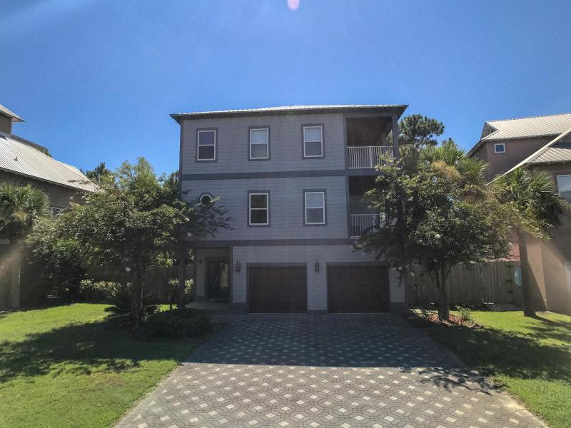 This beautiful 5 bedroom + Office, 4 bathroom home in Gated Cypress Breeze Plantation is just a half mile from the renowned sights and views of Scenic 30A, and Santa Rosa Beach.Low HOA fees with short term rental option for investors. Bike ride or walk to 30A and Beach access, Gulf Place, Restaurants and Shopping. Just Painted Inside and Out! Home backs up to preserve for privacy. The 1st floor consists of the garage,laundry room, and 2 bedrooms separated by a full bath. Each bedroom has access to a deck in the back. The 2nd floor is the large, tiled living/dining area, kitchen, bedroom w/ private porch, and full bath. The enormous kitchen has an island, granite countertops, backsplash, and two toned custom cabinetry. There is access to a porch spanning the length of the house from the living area. The 3rd floor is a bedroom w/ private porch, an office, full bath, and an enormous master suite