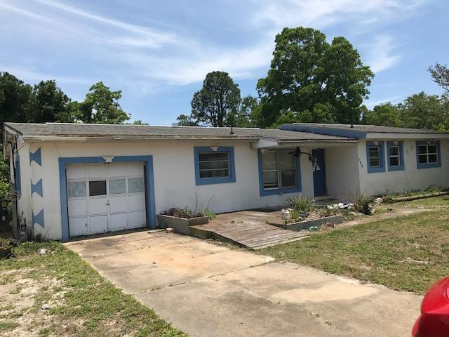 3 bed 2 bath home with one car garage for sale in Mary Esther. Large open living area, roomy kitchen, and large back yard. Fireplace. 1570 square feet. This house needs some updates and TLC, to include flooring, paint, appliances, and general repairs.
