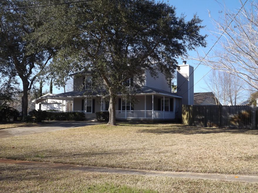 AWESOME MUST SEE HOME! Southern Comfort is how you feel when pulling up onto your circular driveway. The wrap around porch provides fantastic curb appeal on this double corner lot. Great gathering area w/ your friends & family. Inside you have your living area on first floor and bedroom areas on second floor. Enjoy your large L shaped family room with new paint, pretty wood flooring, wood burning fireplace w/ blower, crown molding & textured ceiling. Awesome eat in kitchen with all new appliances and granite countertops. Formal dining room could also be used as an office, playroom etc..1/2 bath downstairs right off the inside laundry area. Brand new carpet on the stairs that lead to the bedroom area. 2 Linen closets in hall. New bath vanities and both baths have skylights for that natural