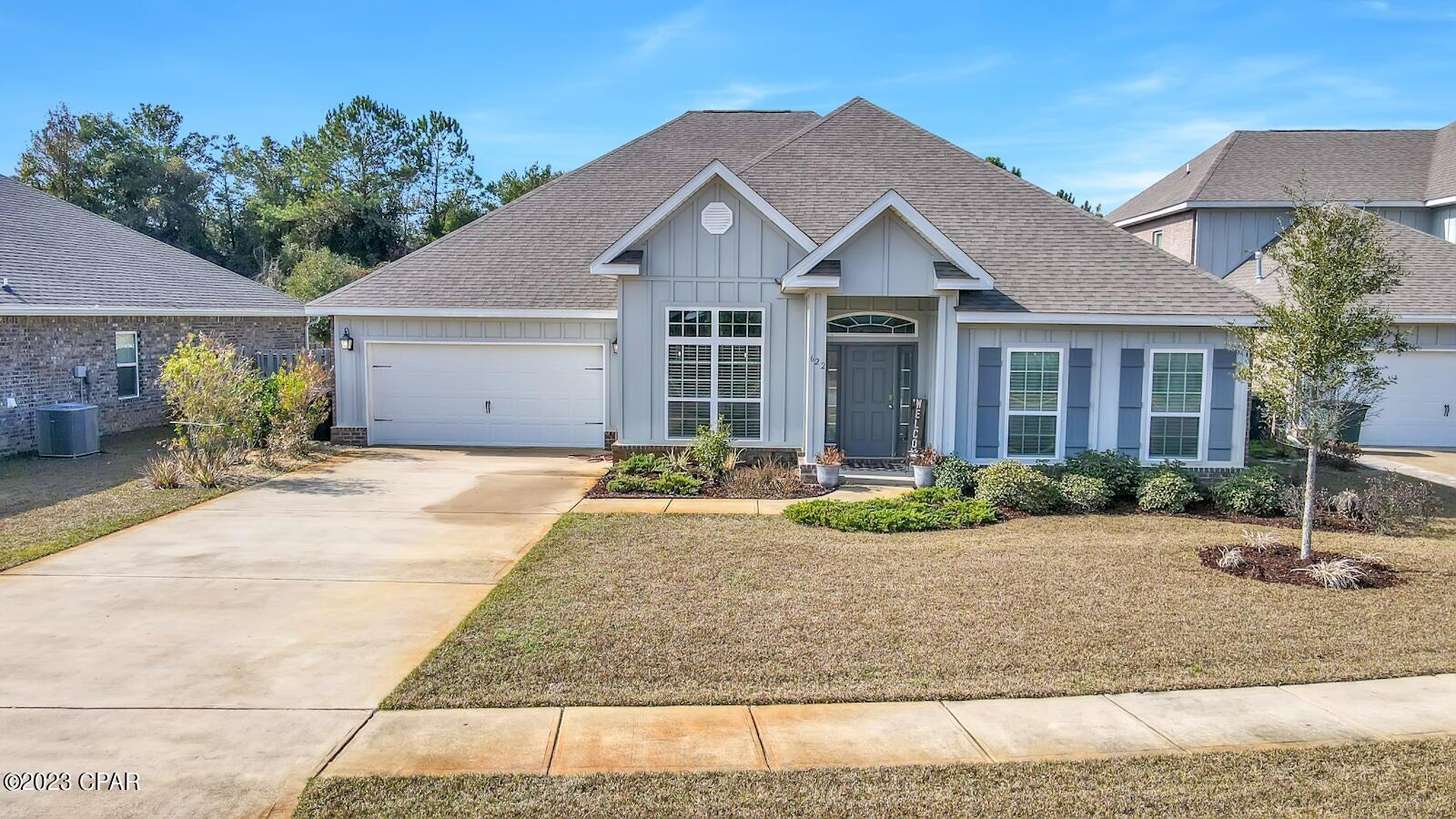 Beautiful, 5-Bedroom, 3-bathroom, McKenzie Floorplan, home in the popular Hammocks Subdivision. This large 3,062sqft home features an open floorplan, large windows, arched doorways, and trey ceilings. The main living areas have LVP flooring, and the bedrooms have plush carpet. The large kitchen features tall, shaker style cabinets, stainless-steel appliances, gas cooktop, vent hood, tiled backsplash, granite counter tops, and a large kitchen island with a double basin stainless sink. The kitchen also has a spacious walk-in pantry. The home has a formal dining room, laundry room, and large family room with fireplace. The master bedroom is spacious and features tall windows for plenty of natural light. The master bathroom is large and features a double vanity, soaking tub, brick accent walls