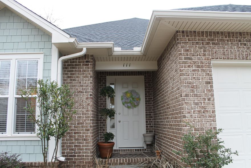 This is your opportunity to own a HUFF home with all the upgrades in Arrowhead. This home has been lovingly maintained by the owner. The builder of this home spared no expense in the finishing details not only inside, but outside. The exterior of this home is full brick with hardi accents. The back yard is fully fenced and on a sprinkler system. The back porch is screened in for enjoying the outdoors. Inside the home has italian hard wood floors throughout the main living areas. The kitchen is beautiful with stainless appliances and granite counters and a wonderful breakfast bar area. The kitchen, dining area and living area are open to each other and spacious. The interior of the home features 10' ceilings with 8' interior doors. The living room features a fireplace with brick hearth