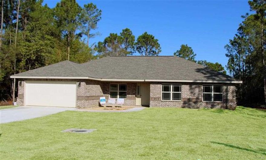 New Construction, Ready Now. This 4 bedroom, 2 bath home was built by Genesis Custom Home Builders. Split bedroom plan. Master bath offers his and her closets, Separate Shower and tub, and granite double vanity. Kitchen offers Granite counters, stainless steel appliances. Breakfast nook and a formal dining space. Kitchen Opens in to family room with fireplace. Spacious additional bedrooms that all have double door closets. Covered front porch and a 10x12 back patio. Large back yard. Sprinkler System. Call us today to make an appointment to see this new home!