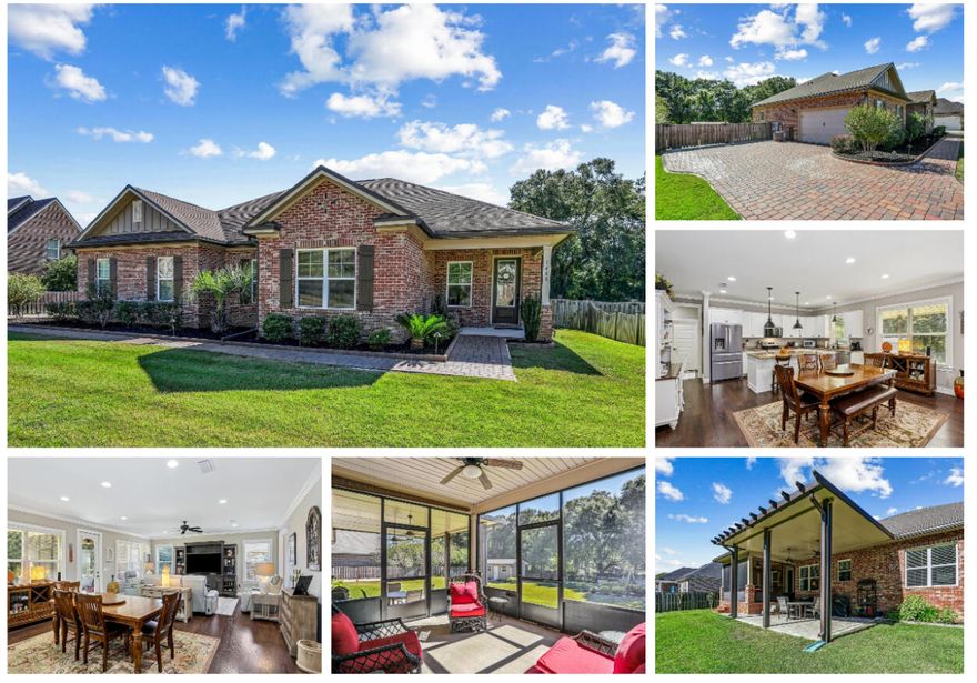 Unmatched curb appeal in the sought after subdivision of Mill Creek Farms. This gorgeous Randy Wise home boasts a custom paver driveway and sidewalk, illuminated with hardwired lighting,  that welcomes you to a generous side entry porch.  An open living/dining/kitchen area is located in the heart of this 4 bedroom/2 bath home. You will find crown molding, 8 foot doors and granite counter tops.  The screened in back porch flows onto a covered patio built by Titan Sunrooms.  The backyard oasis is beautifully manicured and fully irrigated.  The fully fenced yard boasts a 10 x 20 shop, RV pad with a 50 amp electrical hookup, paver firepit area and park like views of the Baker Recreational Arena.  Close to beaches, shopping and military bases; this home has everything you have been looking for.