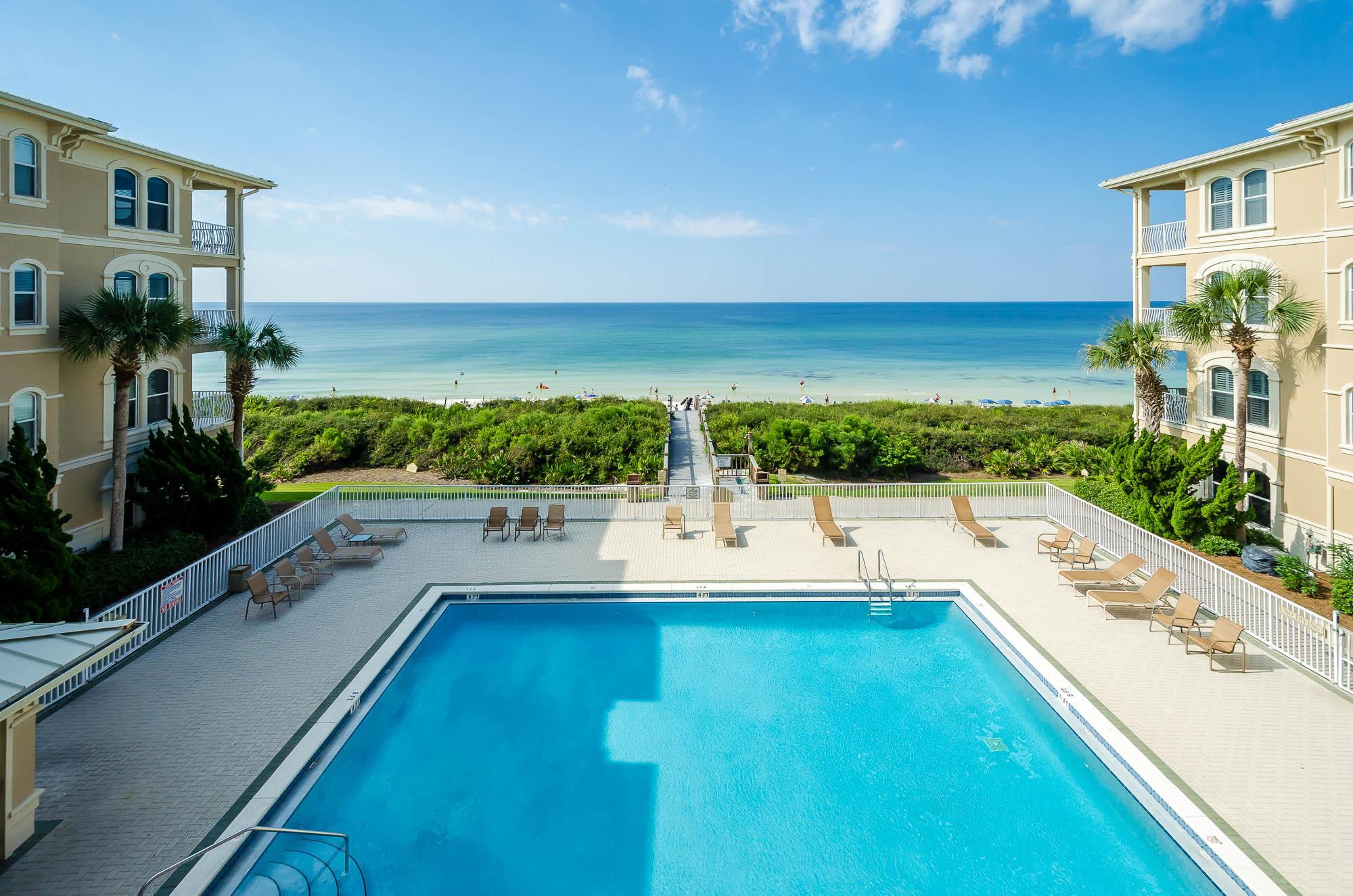 Find this vibrant residence perfectly poised within the coveted community of Sunset Beach, minutes to the Gulf-front pool and private beach boardwalk. Sol Seeker is a two bedroom, three full bathroom home with partial Gulf-views from the second floor balcony. The palm tree lined boulevard escorts you to the well-manicured courtyard that has been nicely designed to provide you with an oasis offering a pleasant respite for morning coffee or a romantic dinner. The French doors welcome you into the coastal inspired decor with local artwork showcased throughout the home. Natural lighting fills the common room from the wall-lined French doors and nearly floor to ceiling windows, highlighting the travertine floors, high ceilings, and gas fireplace. You'll seamlessly flow from the living room into the eat-in kitchen where you'll notice a fully equipped space with ample cabinetry, stainless-steel appliances, granite countertop, custom built in wine rack, and additional breakfast bar seating. Concluding the main level, find a linen closet and full sized bathroom with walk-in shower.
Along the second level of the residence notice wood-flooring through-out each of the dual bedrooms. The master bedroom features a dedicated ensuite with glass-door walk-in shower featuring travertine tile, a generous closet, and direct access to the covered balcony for a perfect place to sip on your coffee in the morning while catching a view of the Gulf. The second bedroom also features a generous closet with direct access to the covered balcony where you will enjoy the salty air and the sound of waves crashing.
You will enjoy the relaxed beach lifestyle where you can park your car knowing you are only minutes to the renowned communities of Rosemary, Alys, and Seacrest Beach with easy access to the incredible eateries, coffee houses, and boutiques scattered throughout the area.