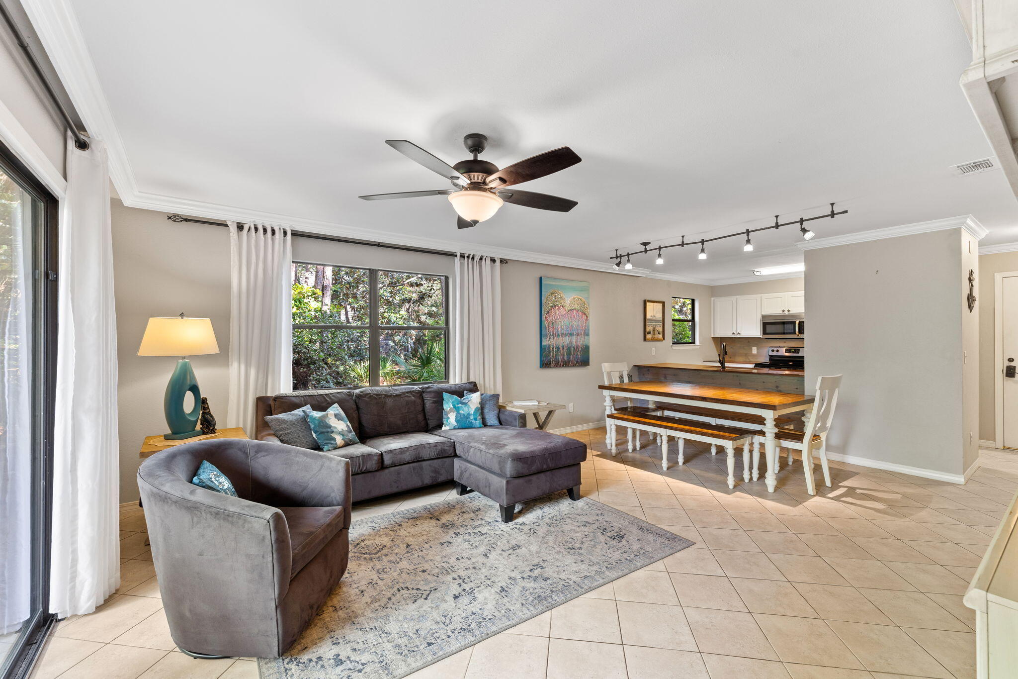 Welcome to your slice of paradise in the serene community of Cassine Gardens, nestled just off the picturesque 30A and moments away from the breathtaking Seagrove Beach. Discover the epitome of coastal living in this meticulously updated townhome boasting stunning views of the private lake and fountain. This coveted end unit offers 2 bedrooms, 2.5 bathrooms, and a spacious 1,268 sq ft of living space. Enjoy the luxury of extra windows flooding the downstairs area with natural light, complemented by the convenience of an additional half bath. Retreat to the master bedroom with its ensuite bathroom, while guests or family members find comfort in the second bedroom or on the sleeper sofa, providing plenty of room for guests or a growing family. Contact today to make #129 yours! The community amenities, including two pools, tennis courts, basketball court, and nature walk. Whether you're looking to relax by the pool or enjoy a friendly game of tennis, this community has something for everyone.
Step outside and explore!