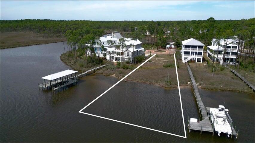 Discover luxury coastal living at Cessna Landing, a private gated community just minutes from 30A's beaches, dining, and shopping. This is your chance to own Lot W-7, the last available waterfront lot with deep water access, positioned on a peaceful cul-de-sac. Included are architectural plans by William Reese Designs for a 3,000+ sq ft home featuring 5 bedrooms, 4.5 baths, a bunk room, elevator, and stunning bay views. Preliminary HOA approval is secured. Enjoy community amenities including a pool, private boat launch, and dock. Build your dream waterfront home today--this rare opportunity won't last long!