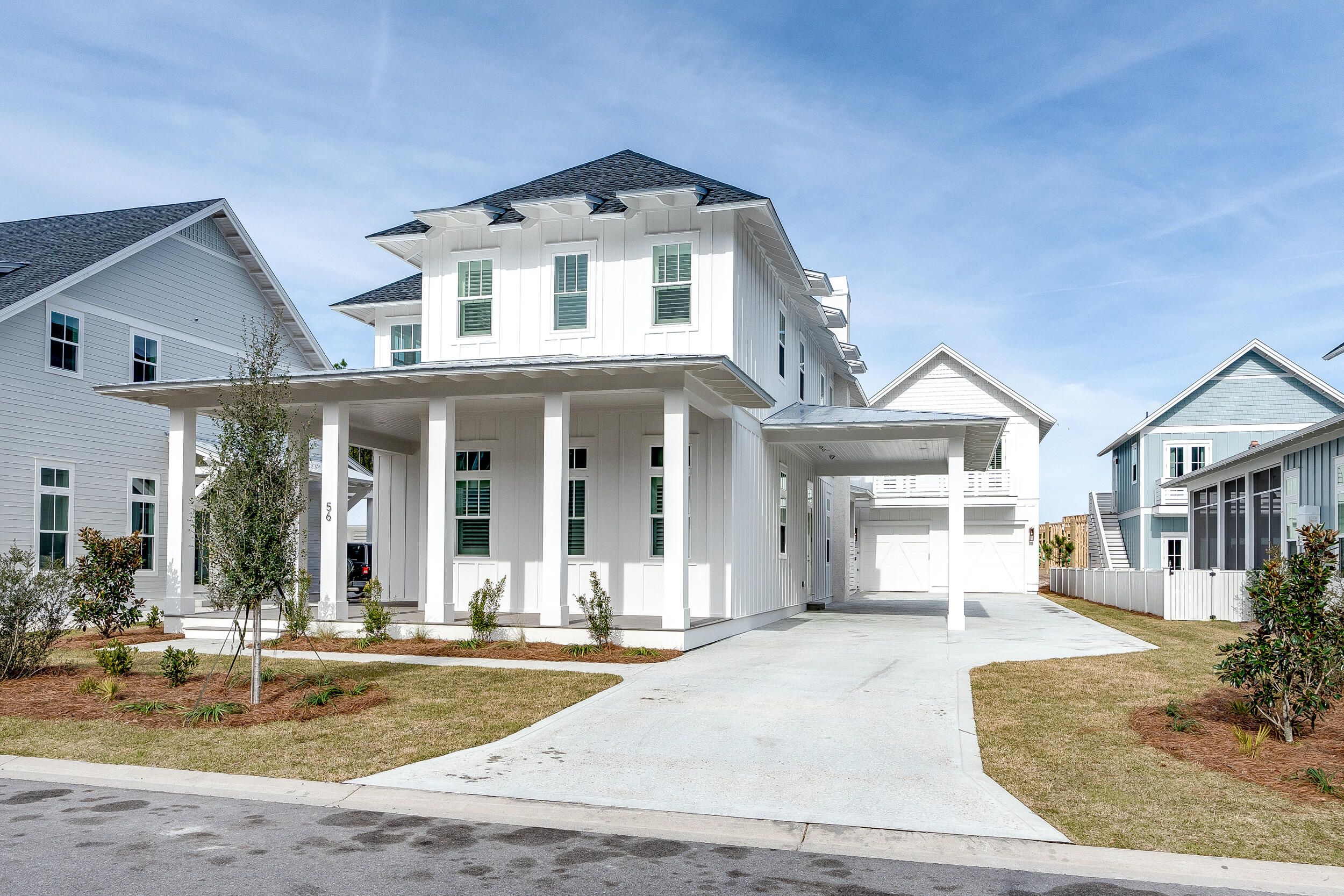 This exceptional Topsail Plan by Cole Construction offers luxury, comfort, and function in the highly sought-after Greenway phase. Move-in ready and in like-new condition, the main home features 4 bedrooms, 4.5 baths, and a separate 1 bed/1 bath carriage house with full kitchen - ideal for guests or extended family. Step into a grand entryway with soaring statement ceilings that set the tone for the elegant interiors. The open-concept main level boasts 12' ceilings, engineered wood flooring, shiplap throughout the common areas, quartz countertops, and a GE Monogram appliance package in the chef's kitchen. The first-floor primary suite includes a luxurious ensuite with a spacious walk-in tiled shower. Upstairs, you'll find three additional bedrooms and a second living area - perfect for a media room or kids' retreat.
Designed for seamless indoor-outdoor living, 16' sliding doors lead from the living room to expansive covered porch areas, including a large screened-in section. The outdoor space is truly a retreat, featuring a private pool and spa, summer kitchen with built-in grill and fridge, and a charming cabana with outdoor fireplace. Additional upgrades include plantation shutters, an interior fireplace, and 10' ceilings on the second floor. Lightly lived in by the builder for just one year - 1-year warranties still in effect. A rare opportunity to own a thoughtfully designed, turnkey home in a highly desirable phase of the Watersound Origins community.
The Watersound Origins community offers an unparalleled lifestyle in South Walton - exceptional amenities, notoriously friendly and welcoming atmosphere, zero short-term rentals, and close proximity to all that 30A and Inlet Beach has to offer. Enjoy the zero-entry pool, playground, sports courts, and fitness center at the Village Commons, play a round of golf or foot golf at the Origins Golf Course, or take a walk along the many miles of walking and biking trails that wind all throughout the neighborhood! The new Watersound Town Center located at the entrance to the community offers several fantastic dining options (casual and formal), medical services, Starbucks, Publix, a Pavilion that hosts events year round, and more!