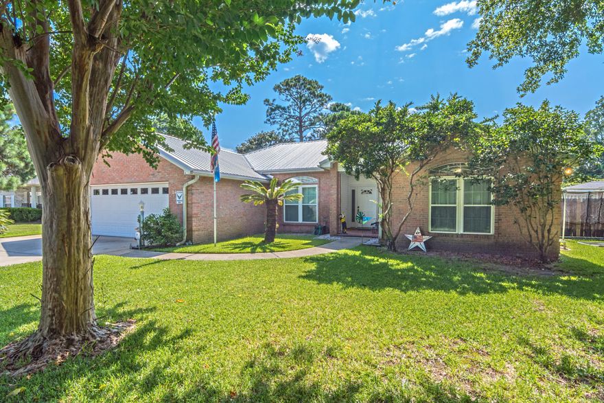 This lovely brick home is a 3-bedroom, 2-bath that has living room gas fireplace to cozy up to. This astonishing house also has a superior dining room, enjoyable breakfast area, and a relaxing den that leads to the newly glassed-in 3-season Florida room. Some other features of the home are: high ceilings, hardwood flooring in the living areas, new energy efficient windows, an updated kitchen with granite counters, refaced cabinets, and newer stainless steel appliances, laundry room with cabinets and shelves, and lastly, both bathrooms have been remodeled and have double sinks. Outside you will have a fenced-in tropical paradise with ruby red grapefruit trees surrounding your pool. Bonus, the patio features a retractable awning. Buyer to verify square footage and all other data.