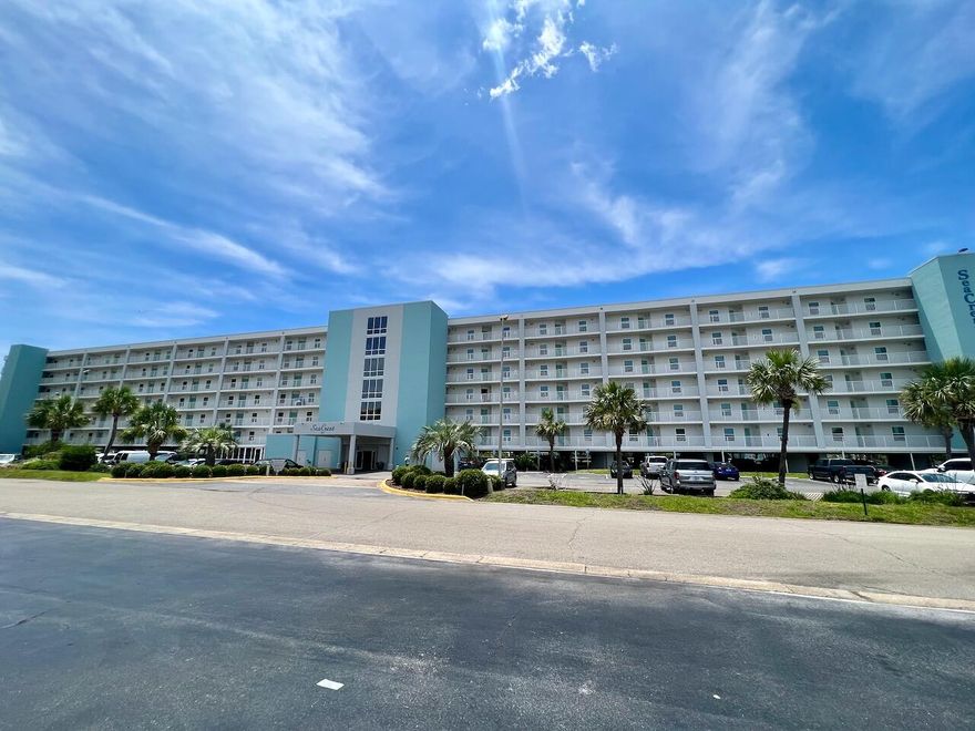 Partially Furnished Condo for Long Term Rent on Okaloosa Island. View of the Gulf of Mexico from primary bedroom and living room. Covered Balcony. Open Floor Plan with Kitchen Bar, Dining Area and Living Room.